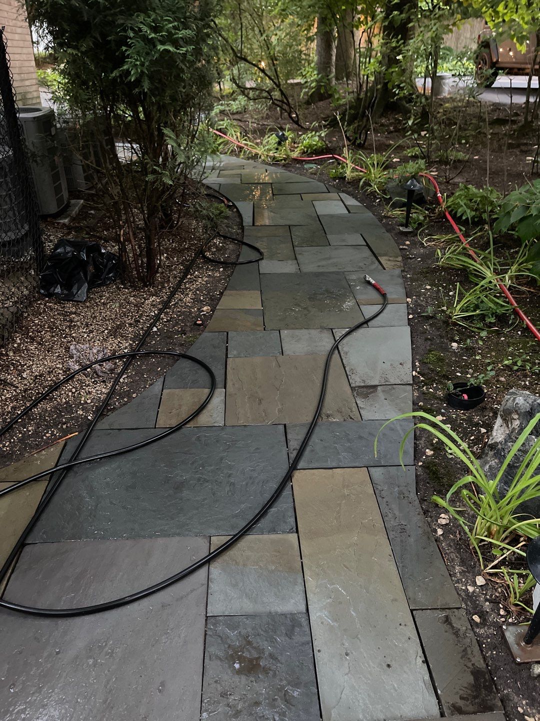 Bluestone patio cleaning by Northern Power Washing LLC.