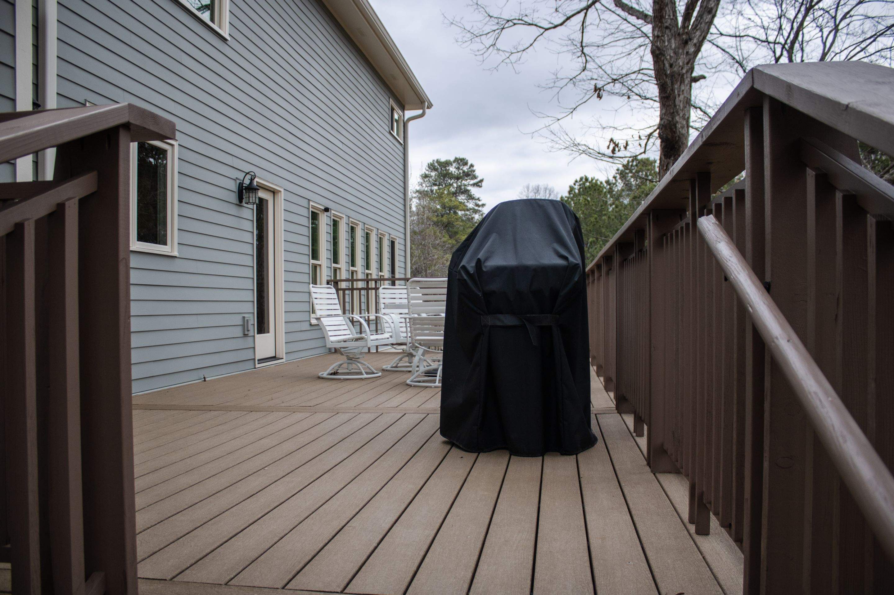 James Hardie Siding Replacement, Exterior Painting, Deck Stain, and Gutter Installation in Peachtree Corners, GA by Nelson Exteriors