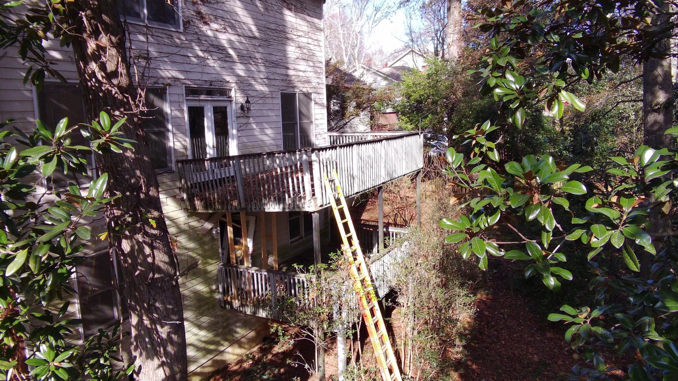 Multi-Level Pressure-Treated Wooden Deck Construction in Decatur by Swift Home Renovations