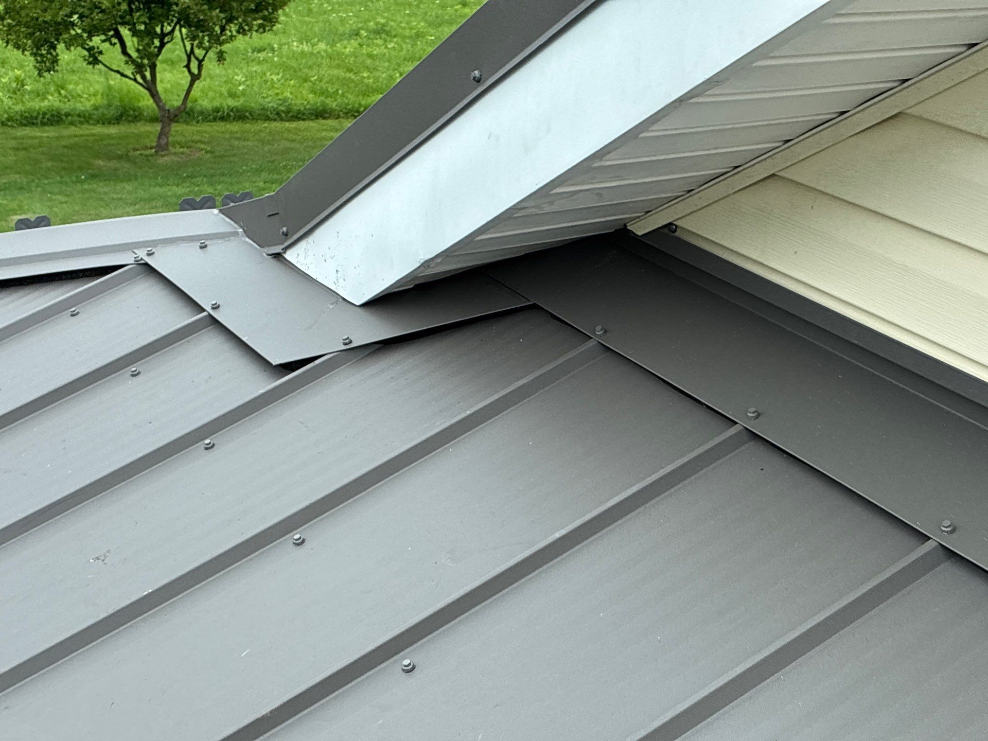 Newport Metal Roof Replacement with New Skylights by Esh Builders