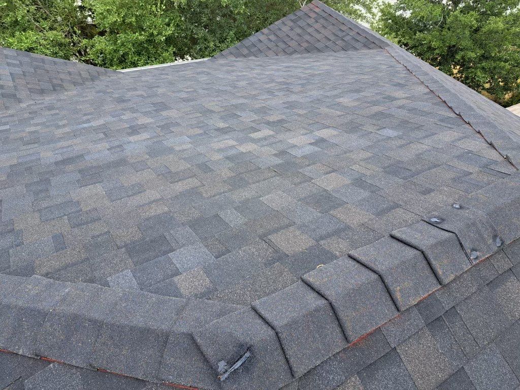 Residential Roofing Replacement and Gutter Installation in Manor by Caliber Restoration LLC