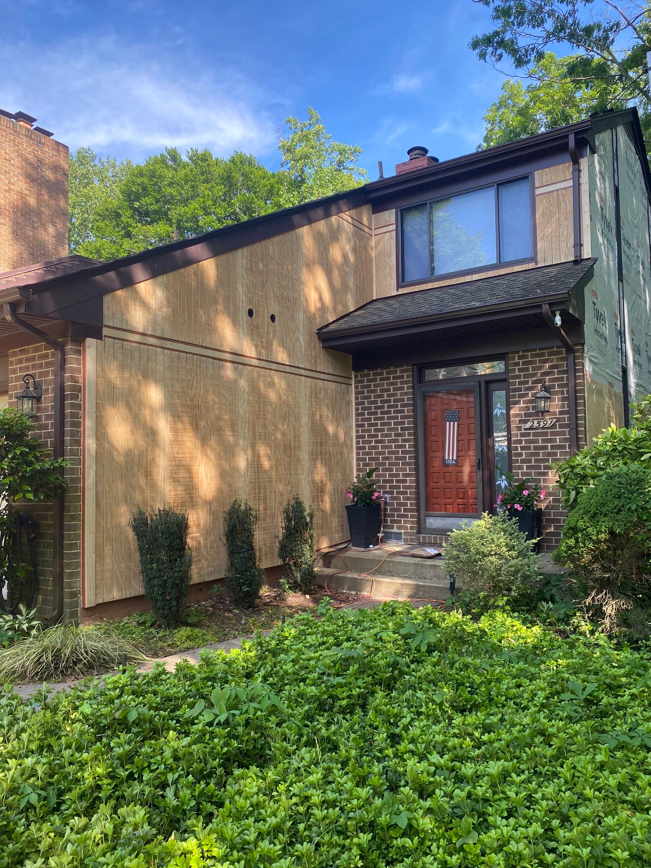 Woodbridge: T1-11 Pywood Panel Siding Installation by RM Banning, Inc.