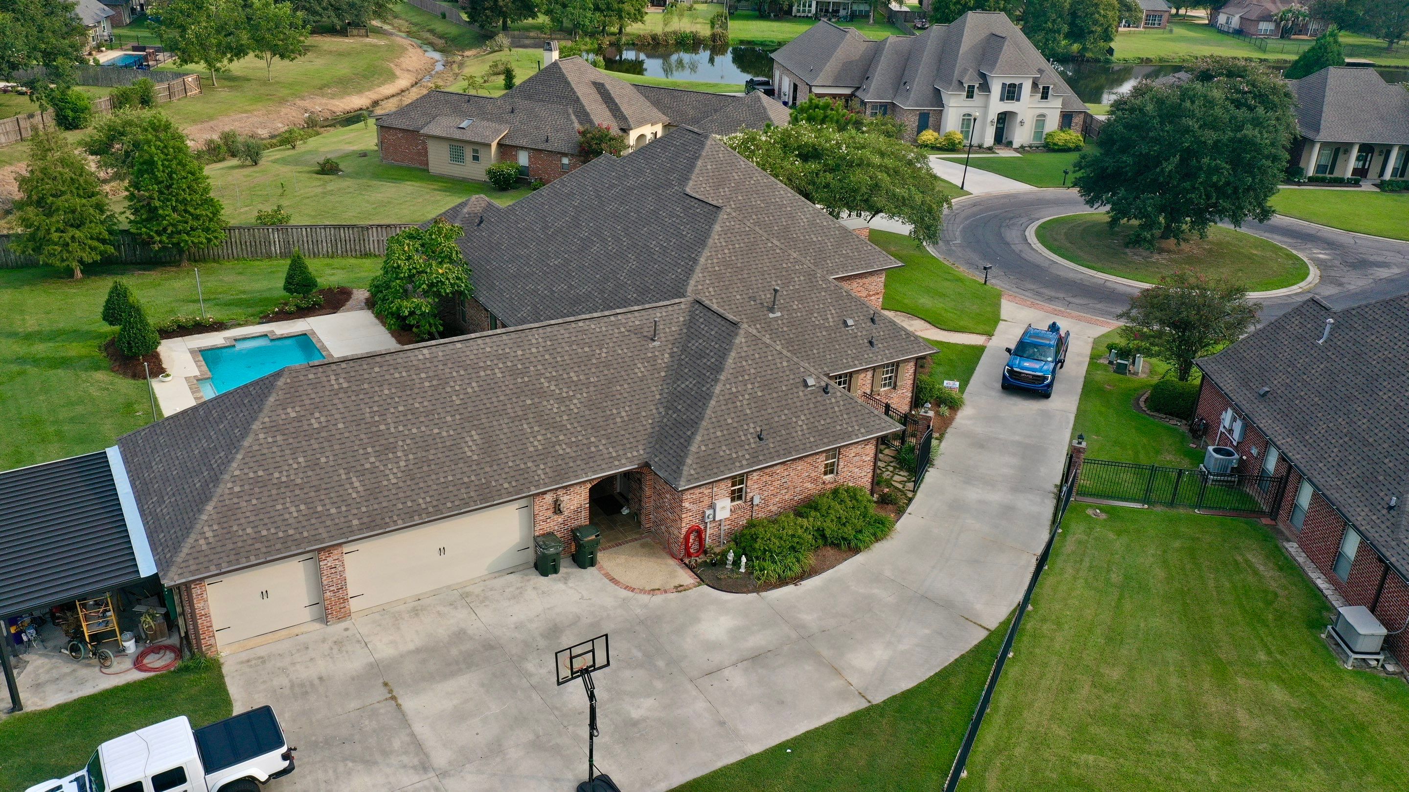 Residential Roofing Installation using Atlas Pinnacle Impact Weathered Wood; Weathered Bronze Gutters  by Top Team Construction