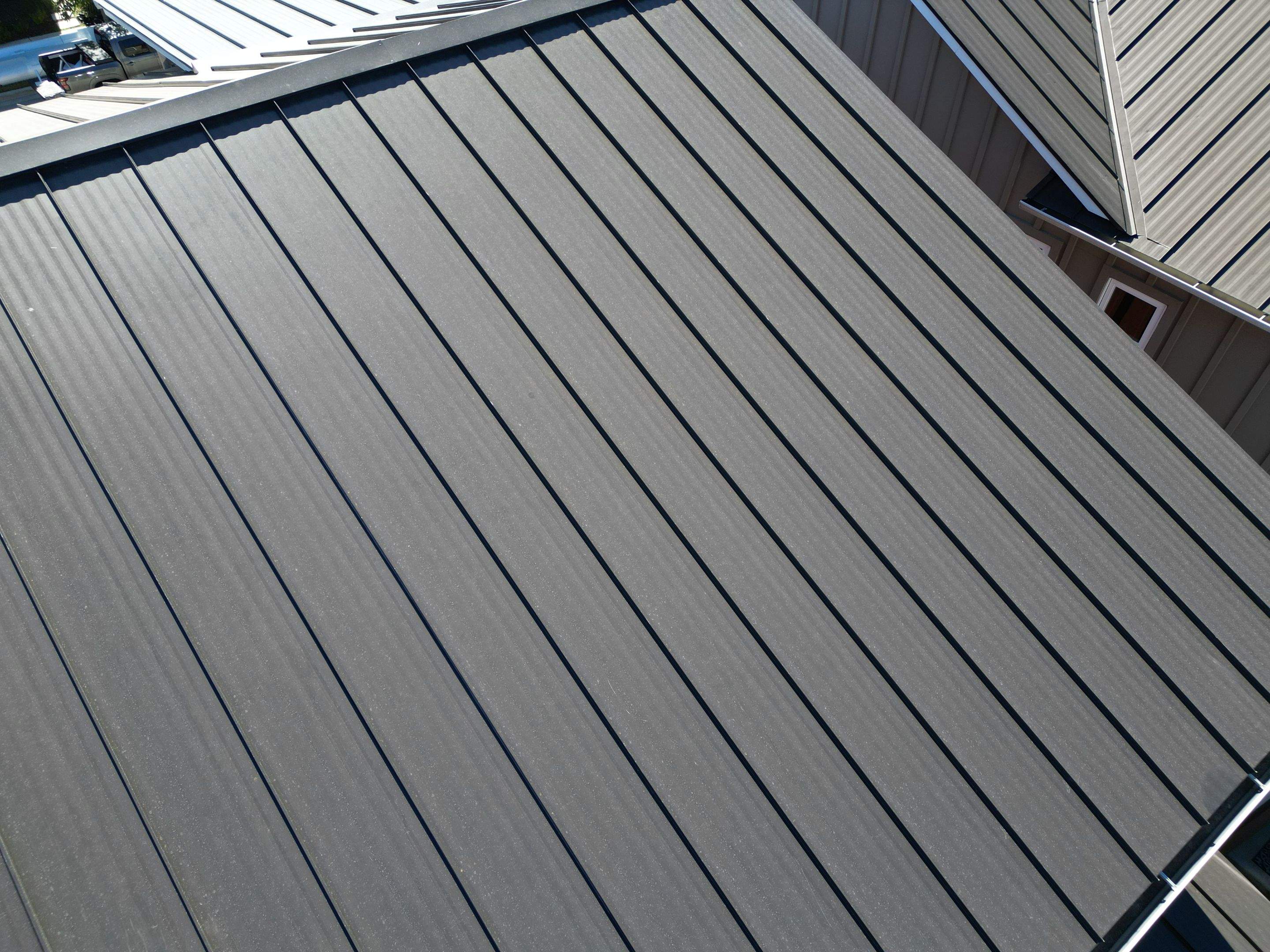 Dark Bronze Standing Seam Metal Roof by RoofsOnly.com