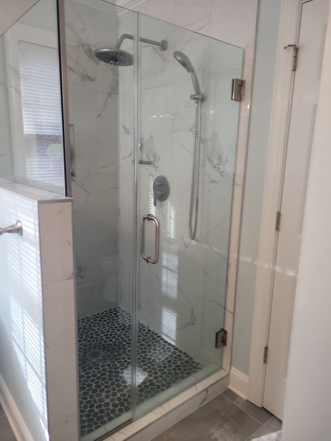 A Stunning Cary Bathroom Reimagined by Elite Remodeling and Design LLC