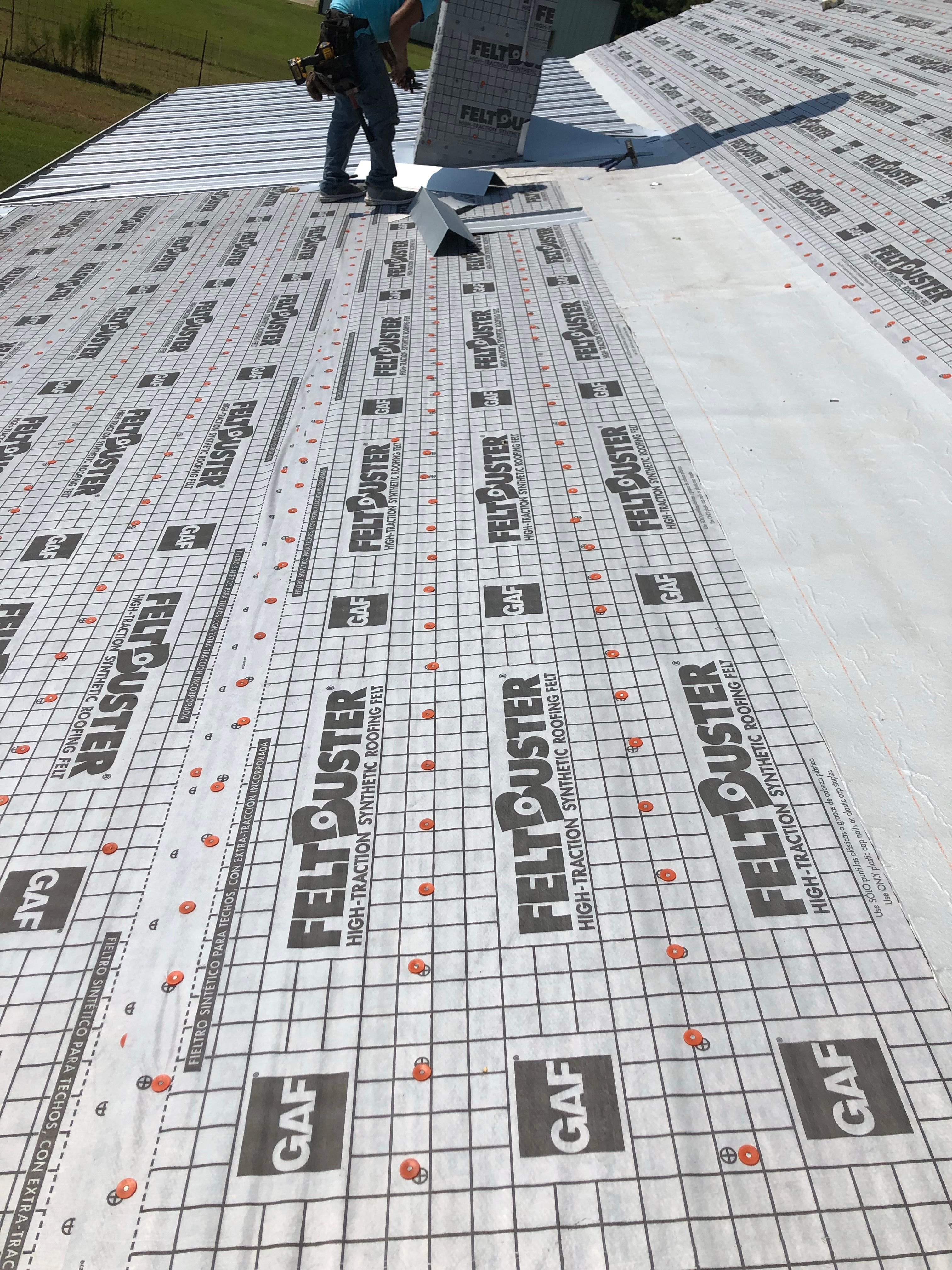Residential Roofing Installation using Metal roofing by American Roofing & Construction LLC