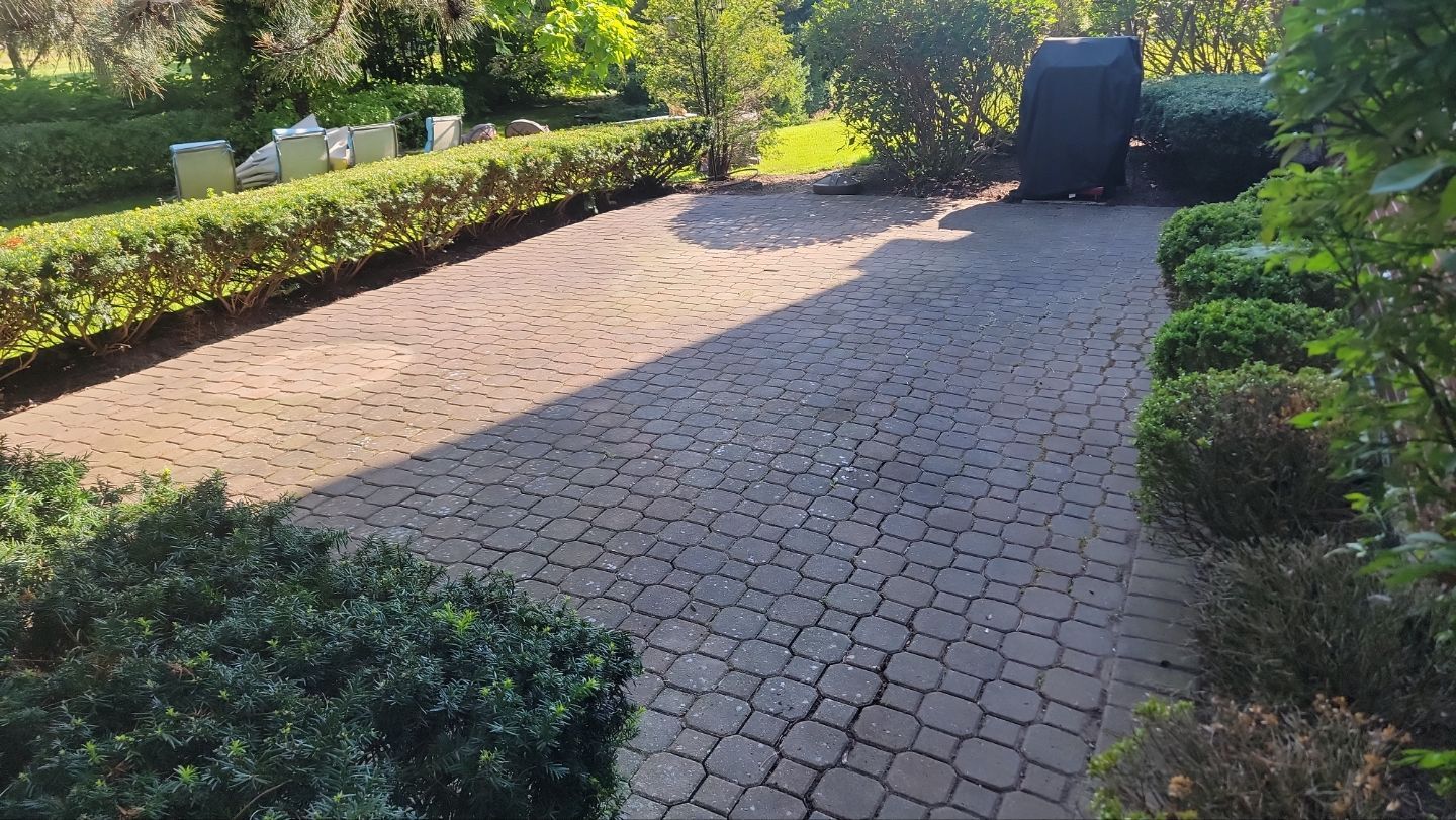 Brick paver repair, clean and seal by Northern Power Washing LLC.