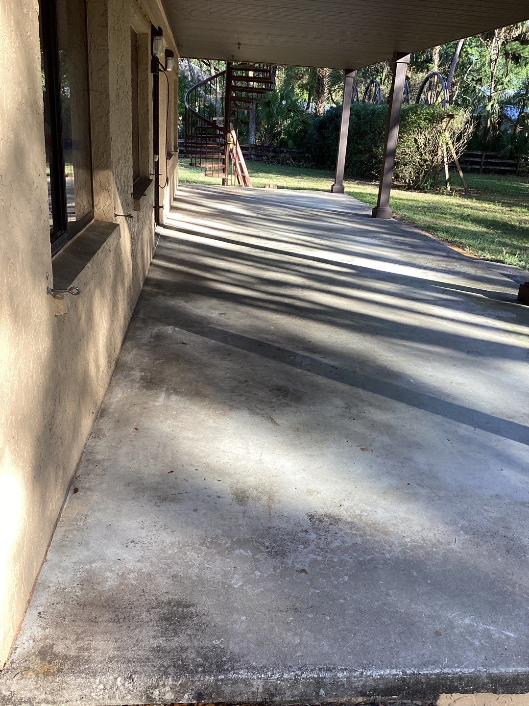 Patio using Pebble Beach by Amvet concrete coatings llc