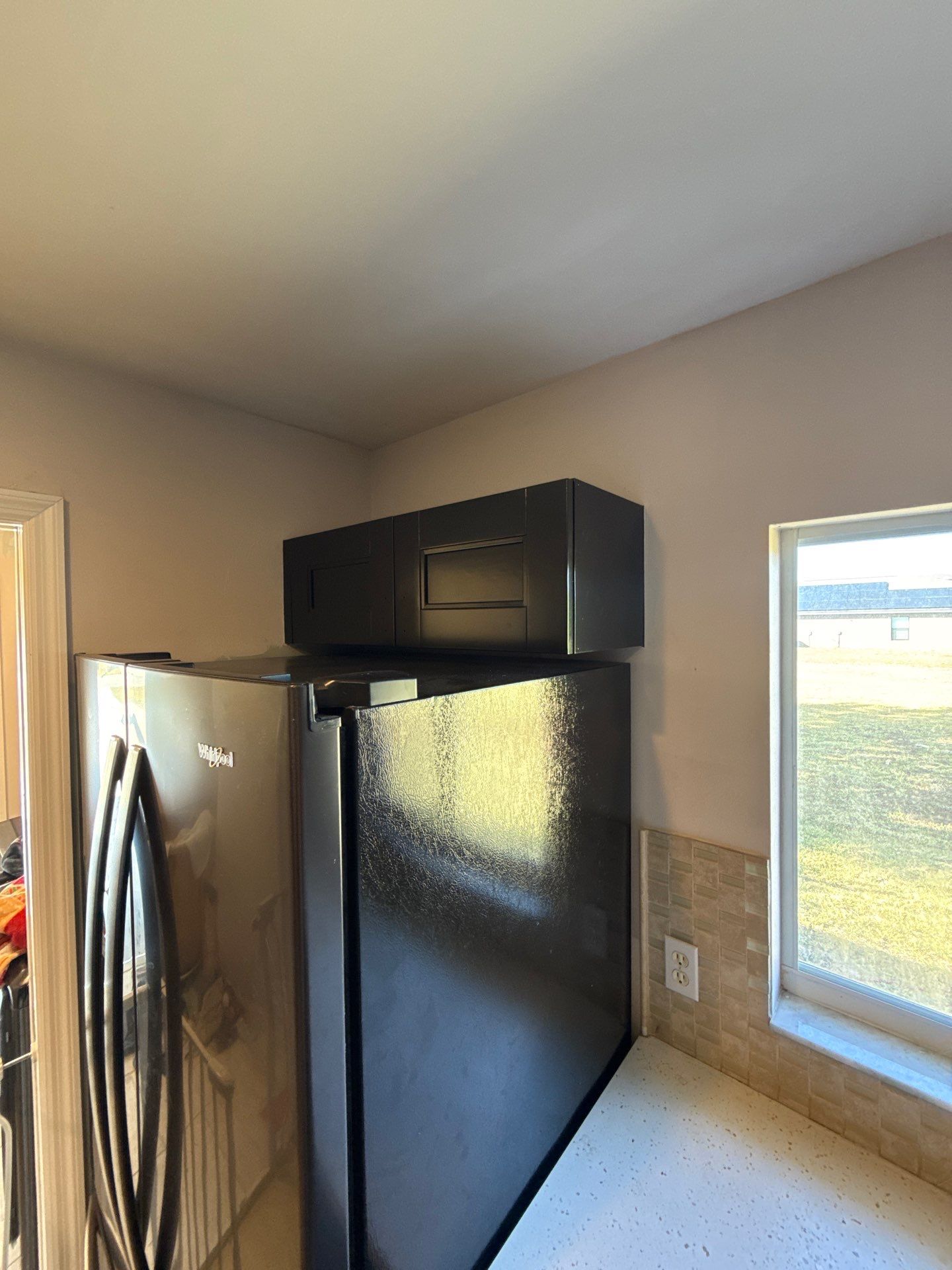 Cabinet Repaint by Fresh Coat Painters