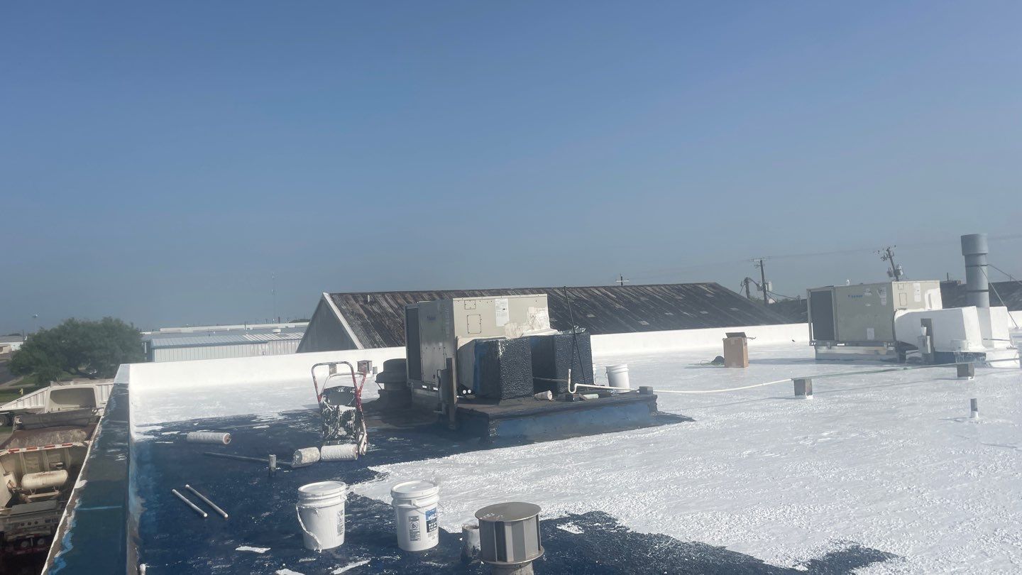 Dirty leaking Gravel Roof by Bayfront Roofing and Construction