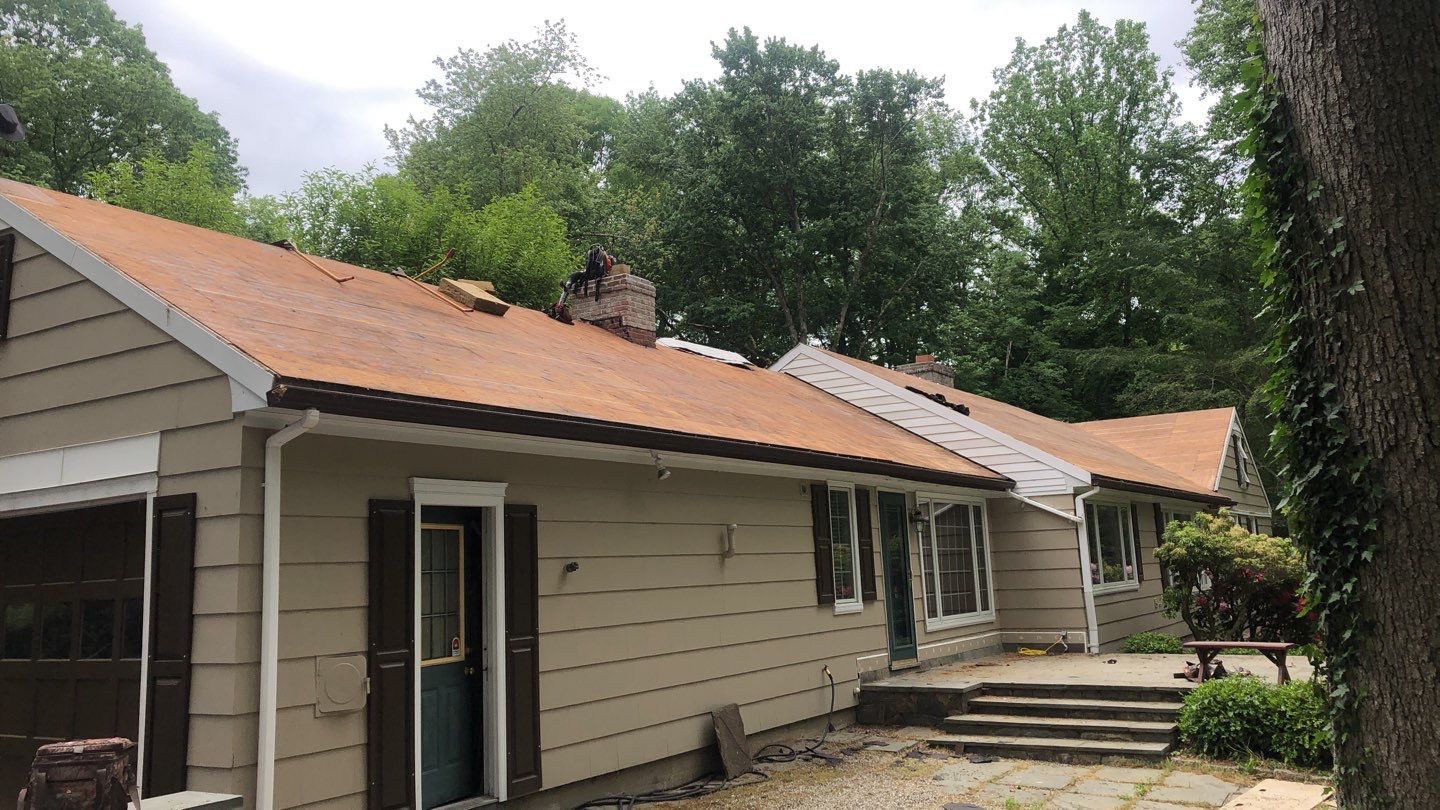 Commercial Roofing Installation using Owens Corning Duration Driftwood by A Plus Exterior