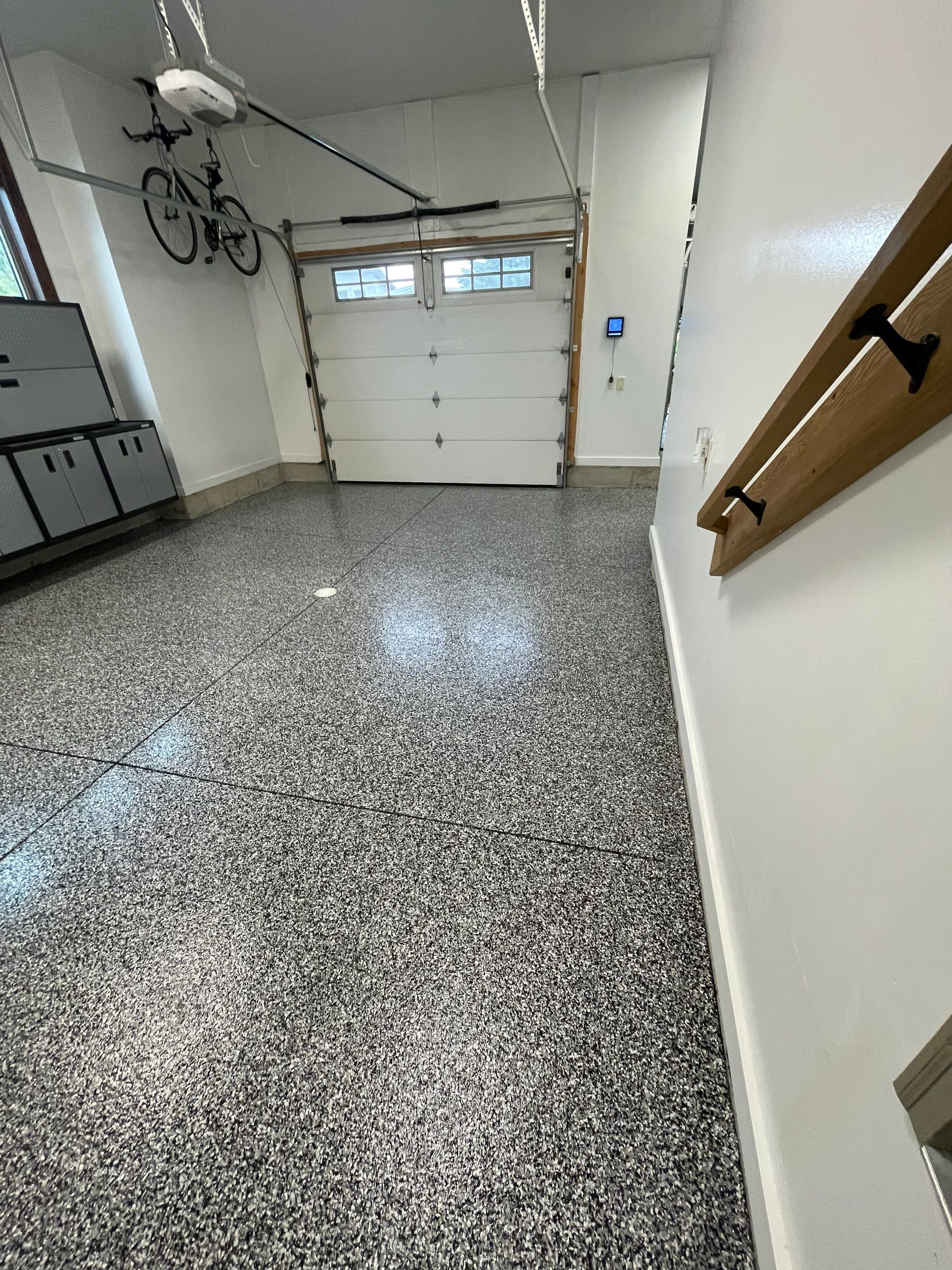 Garage Floor Coating and Domino Flake Finish in Sioux Falls by Select Painting, Coatings & Garage Cabinets