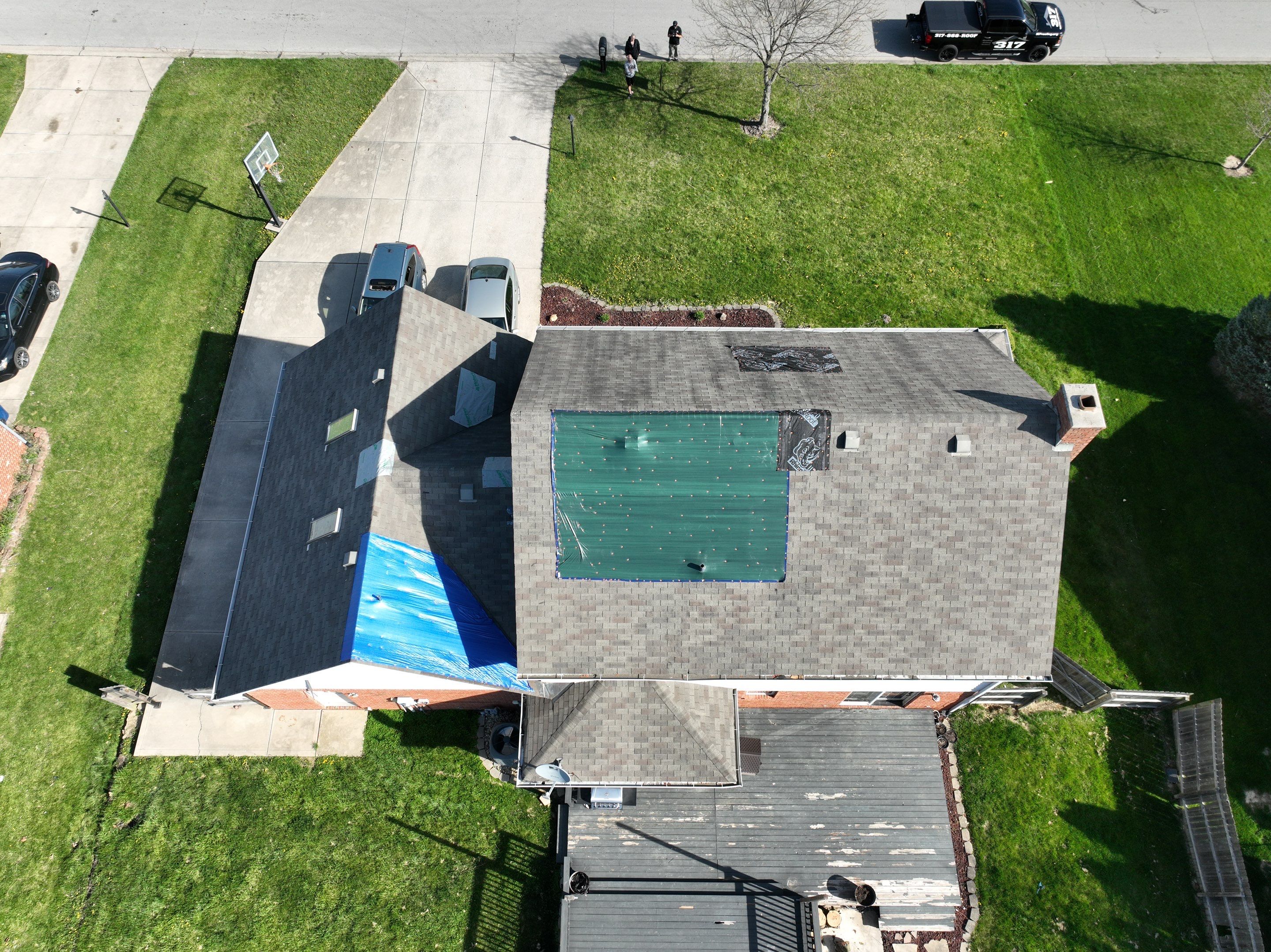 Tornado damage in Whiteland. Roof replacement, James Hardie siding, exterior paint, gutters, windows, doors by 317 Roofing & Restorations