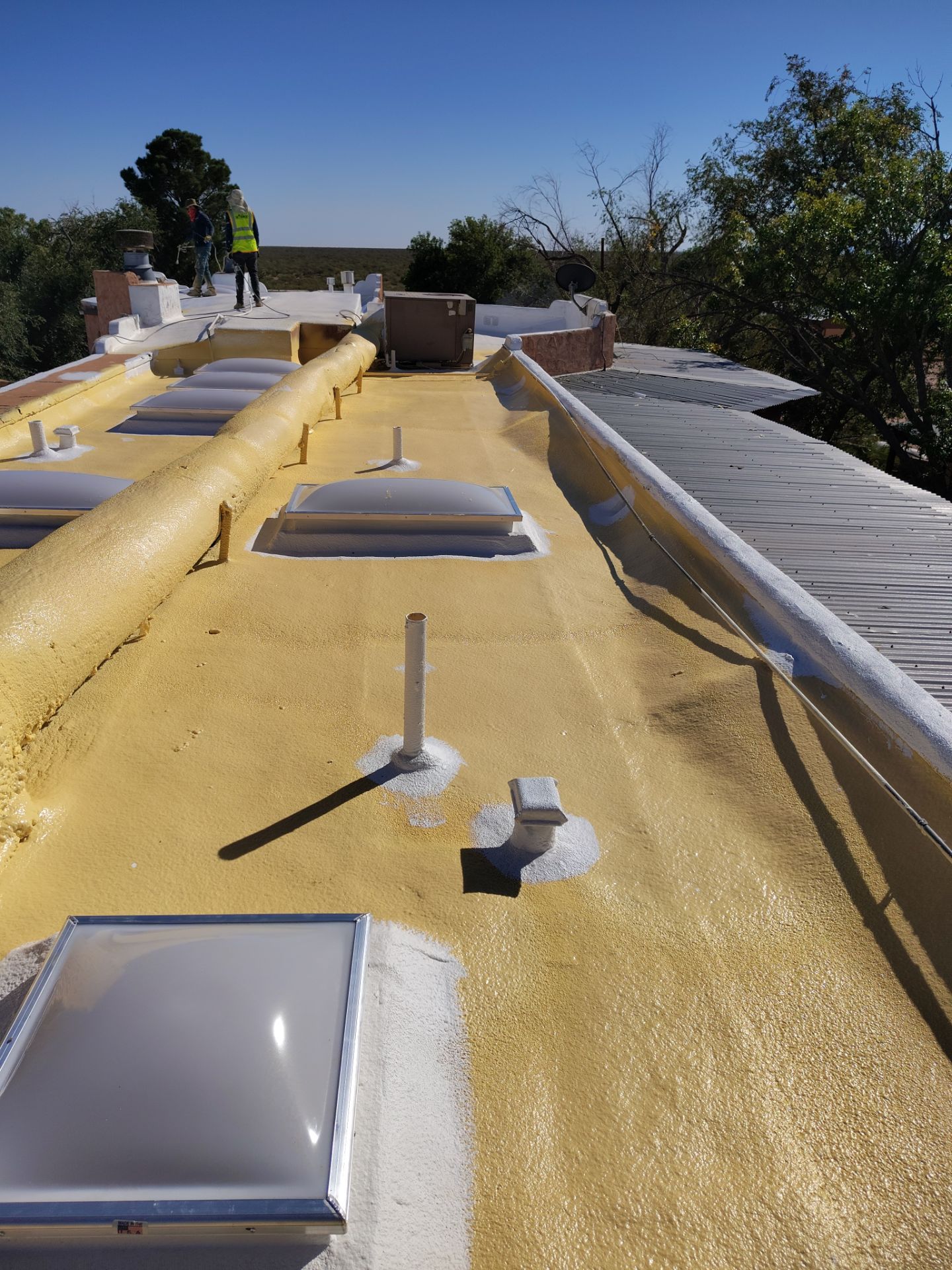 Residential roof application by SPF Services 