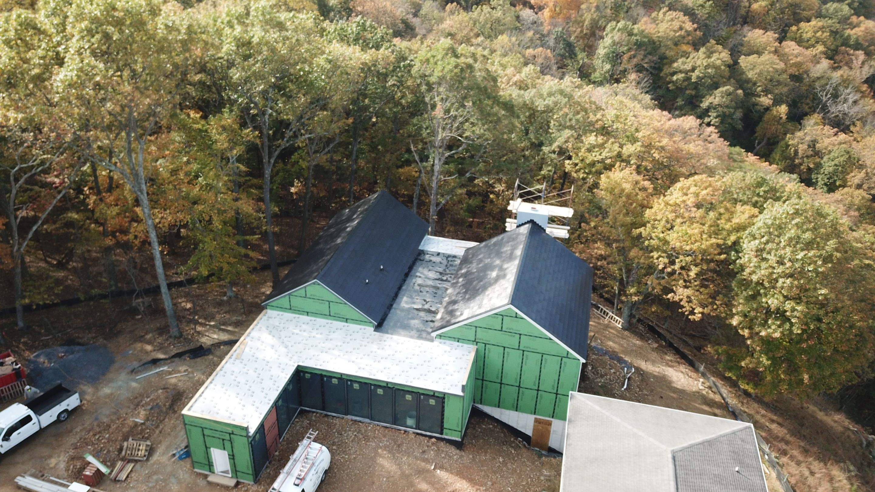 Roof Installation using Tesla Solar Roof V3 by American Home Contractors