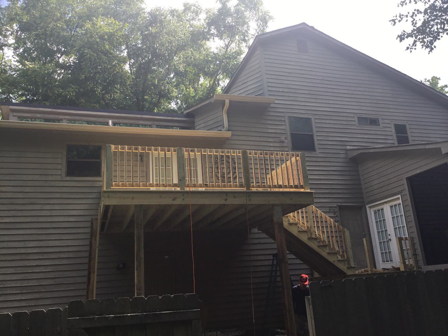 Elevated Wooden Deck and Front Porch Renovation in Marietta by Swift Home Renovations 