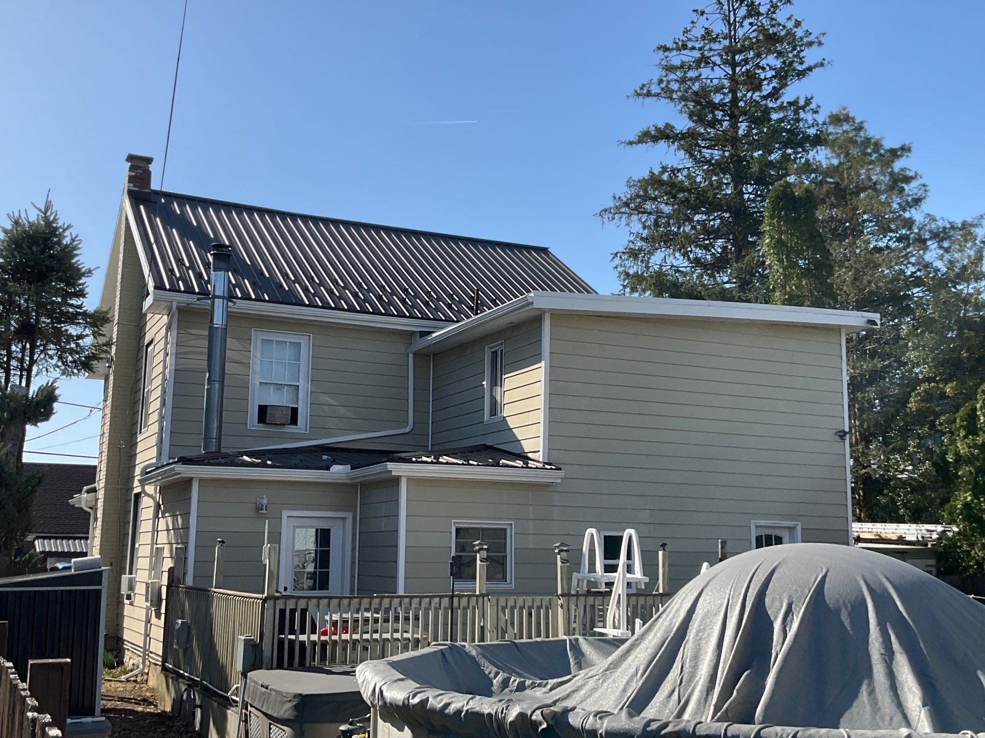 Textured Bronze Roof and Flat Membrane Installation in Hershey by Esh Builders