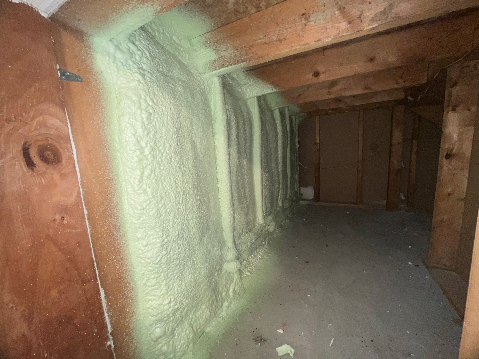 Garage ceiling using open cell spray foam by NYS Foam & Energy