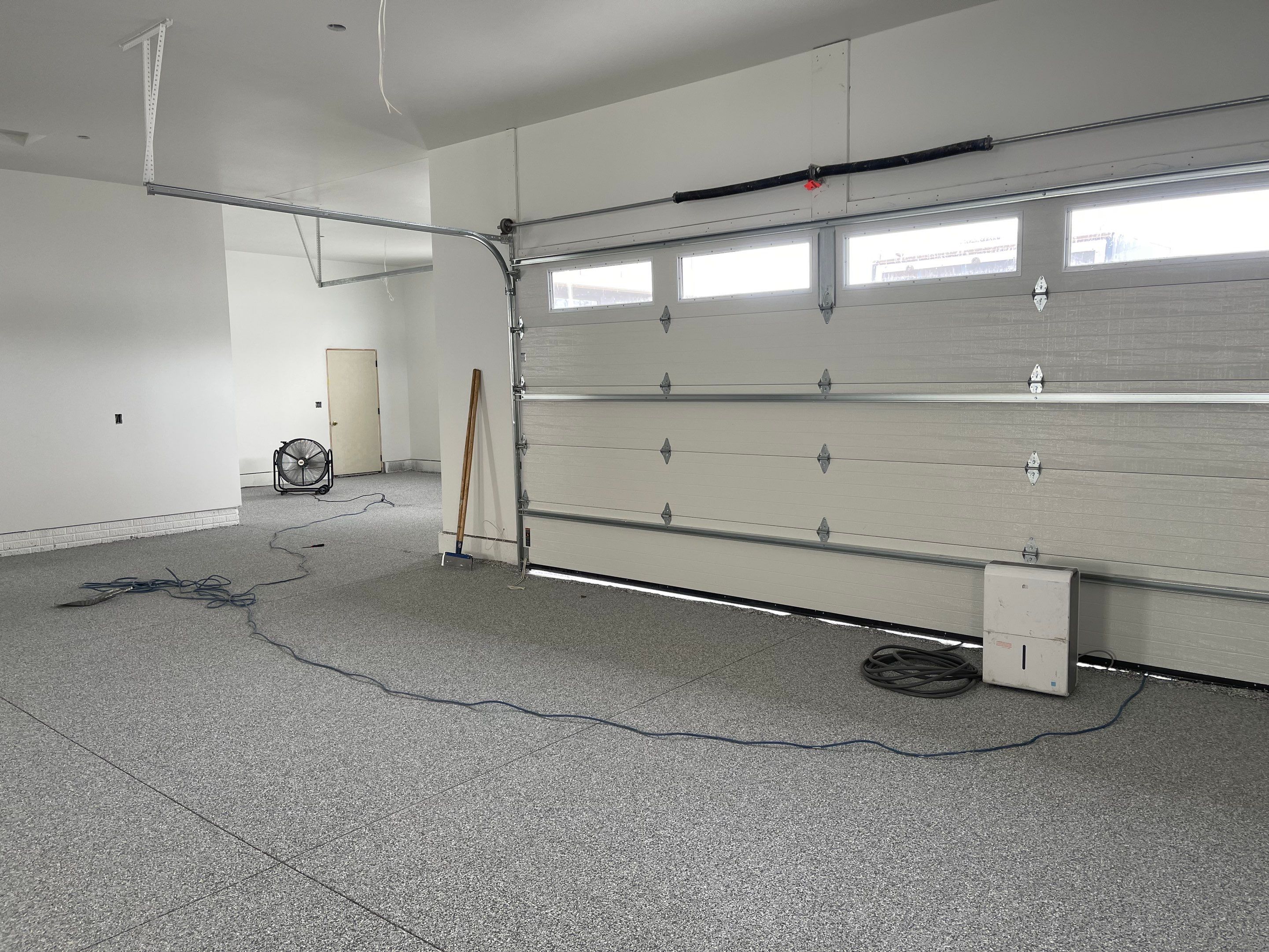 Garage using Slate Stone by Select Painting, Coatings & Garage Cabinets