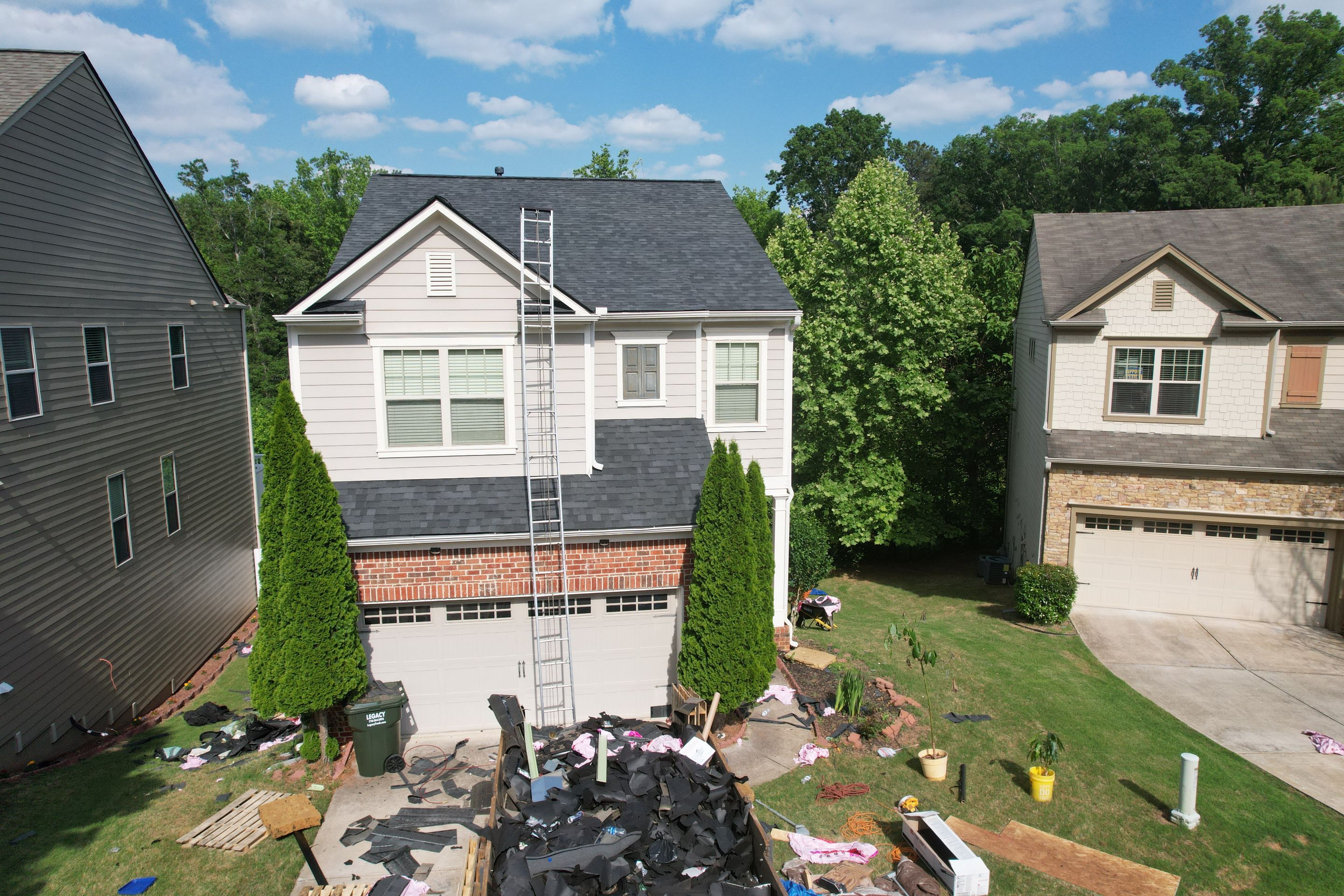 Residential Roof Replacement using Owens Corning Trudef Twilight Black by Inspector Roofing and Restoration