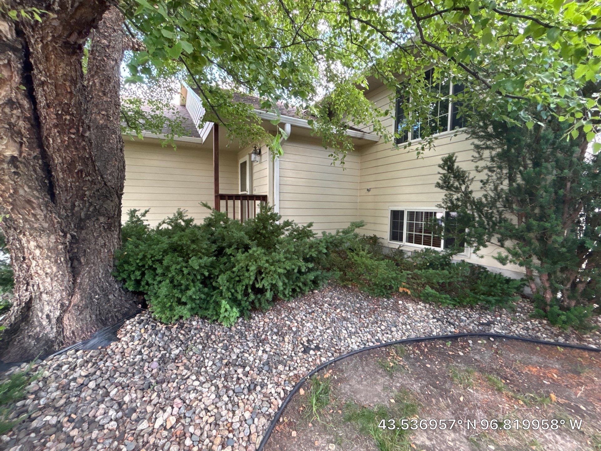 Sioux Falls Exterior Siding Replacement and Custom Deck Upgrade by Select Painting, Coatings & Garage Cabinets