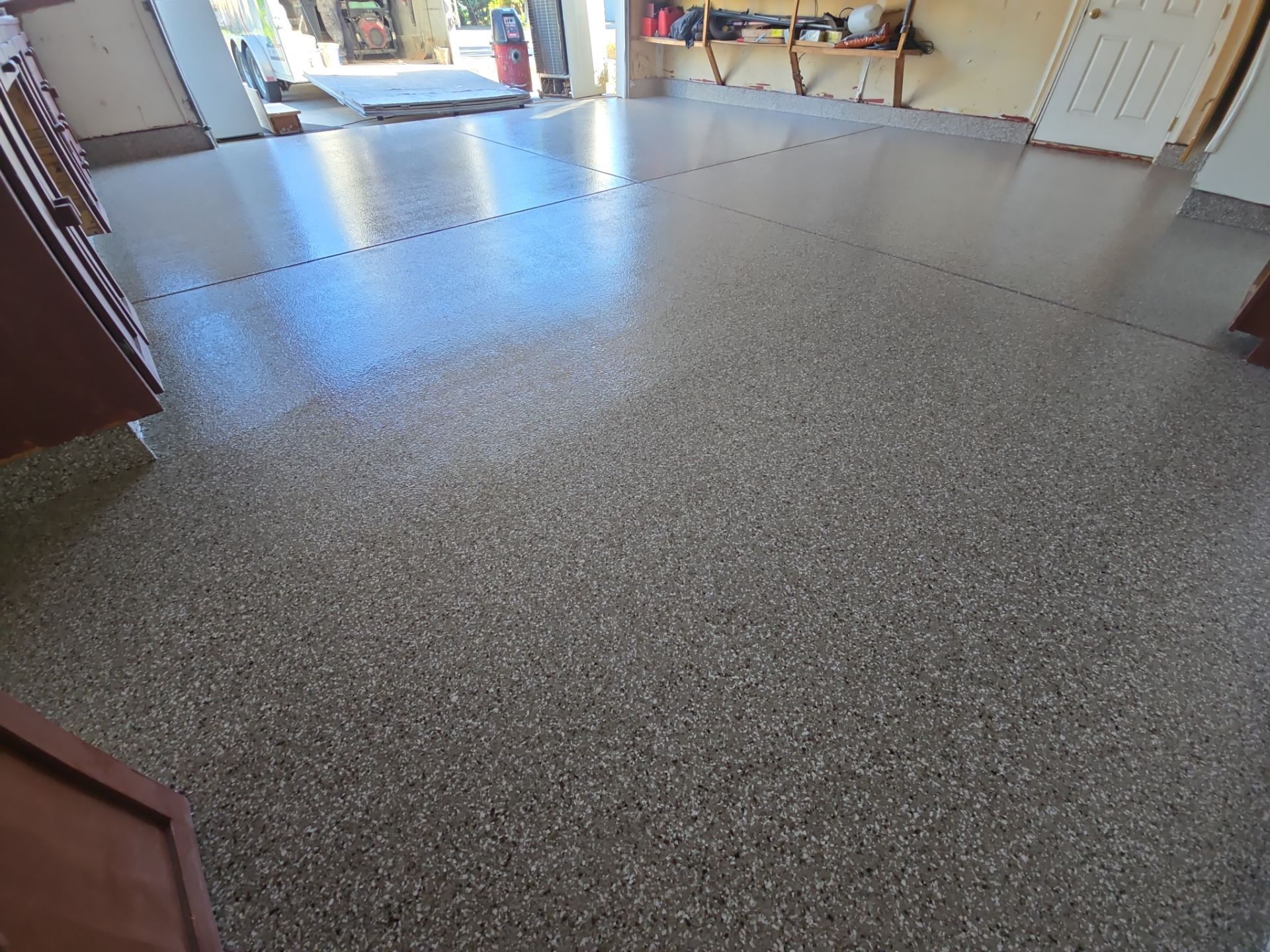 Garage Transformation using Pebble Beach by Croc Coatings, LLC