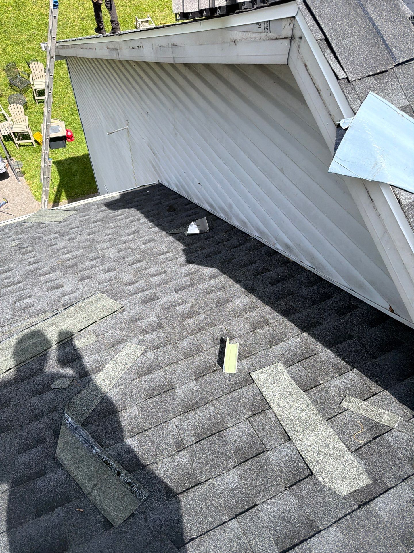 Residential Roofing Installation using GAF Timberline HDZ Charcoal by Rainstoppers Roofing