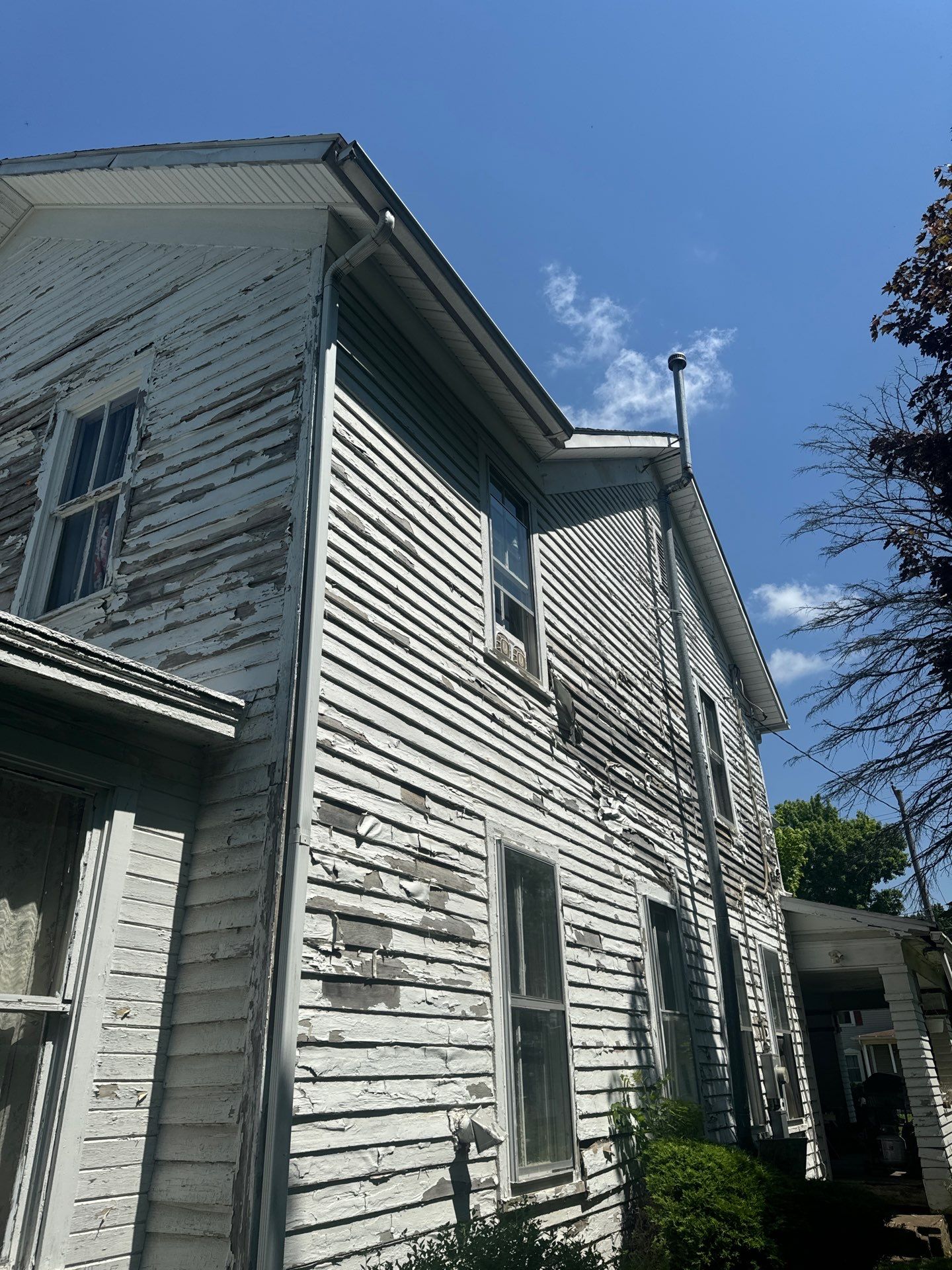 Siding Installation using Vinyl Siding by Rainstoppers Roofing