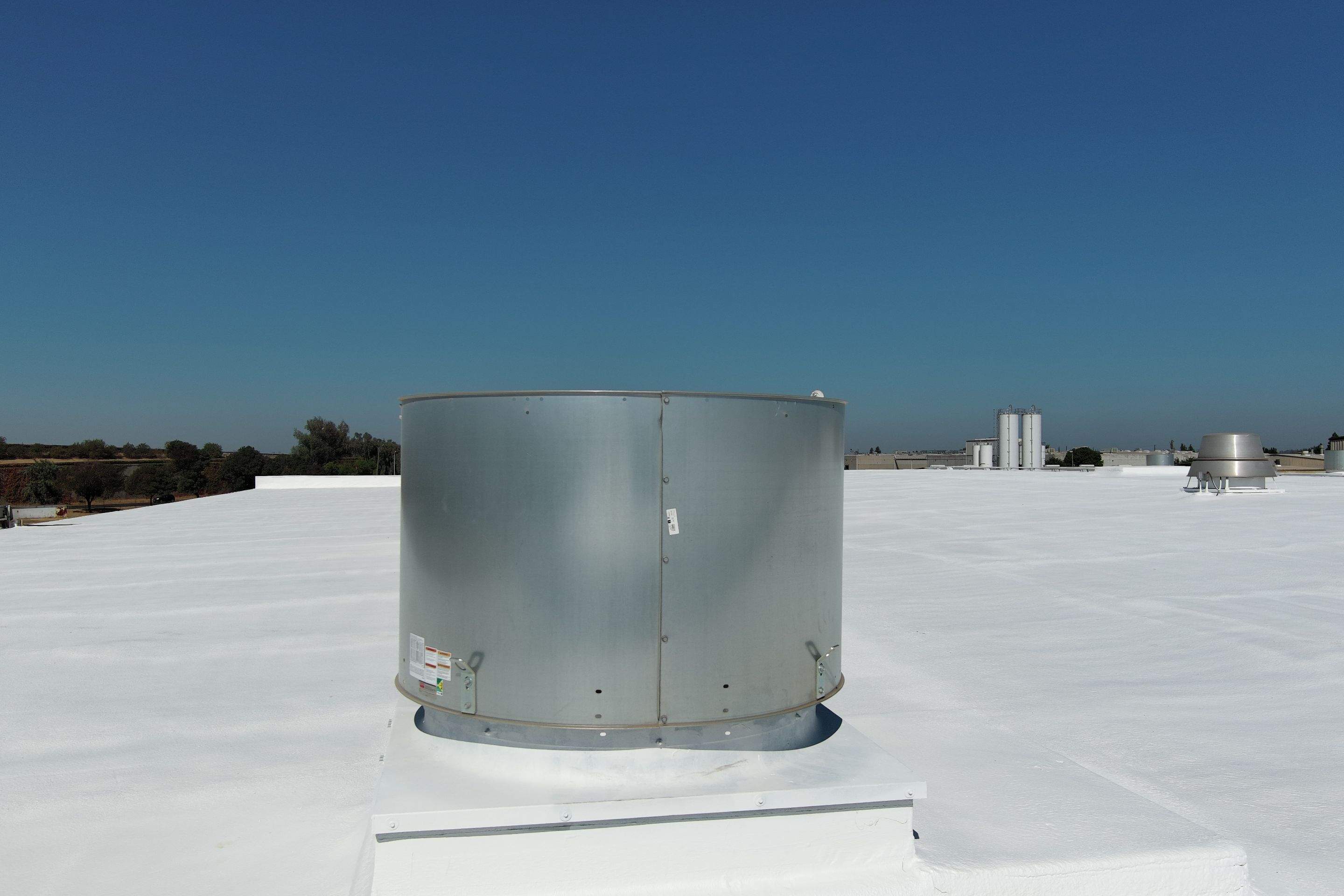 Pro Farms Spray foam roofing project by Straight Edge Roofing Inc