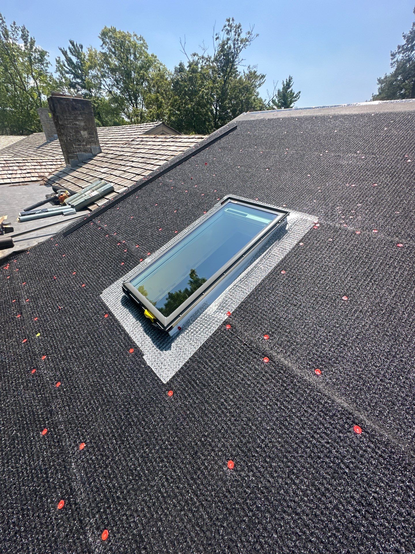 Residential Roofing Installation using Cedar Shake shingles  by Nitro Roofing and Construction