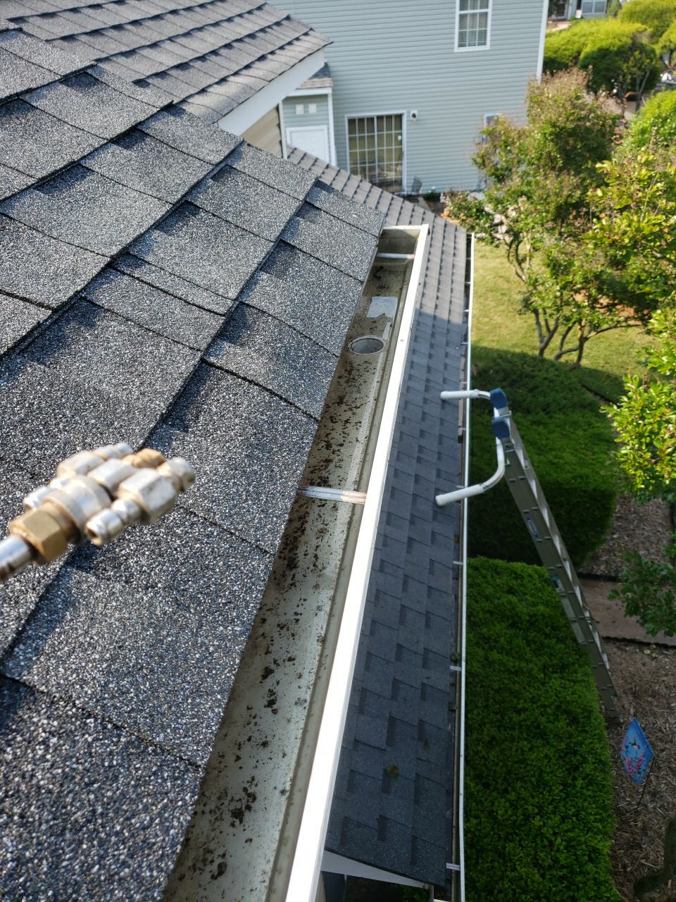 Gutter Cleaning using water by Power Wash Masters LLC