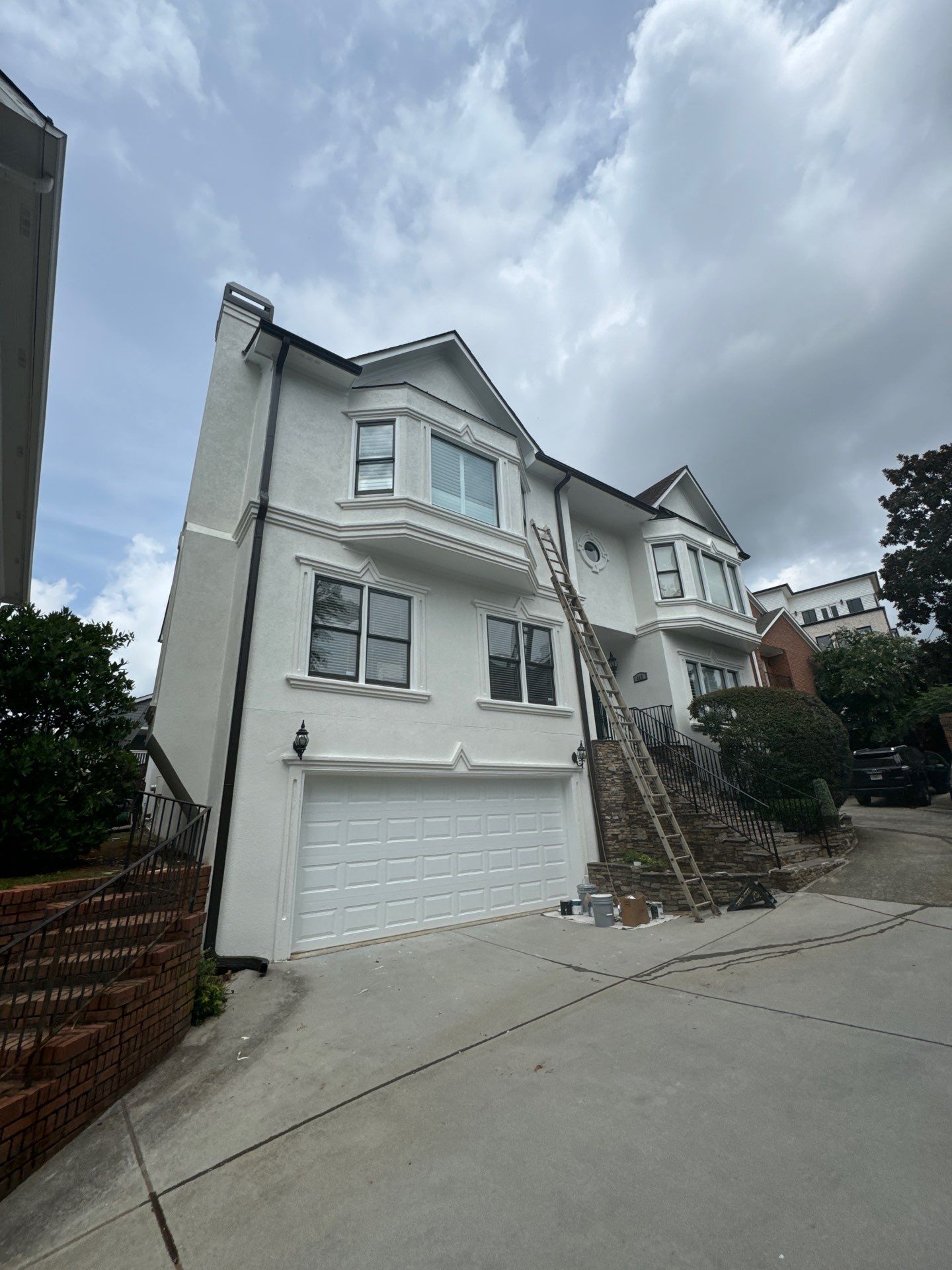 Full Exterior Stucco Painting and Wood Deck Staining in Atlanta by Swift Home Renovations