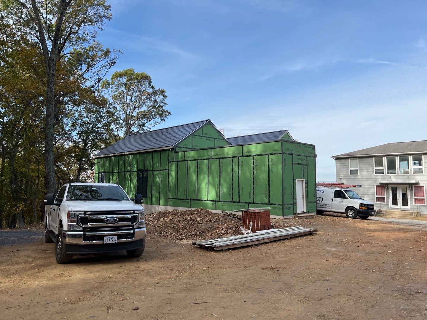 Roof Installation using Tesla Solar Roof V3 by American Home Contractors
