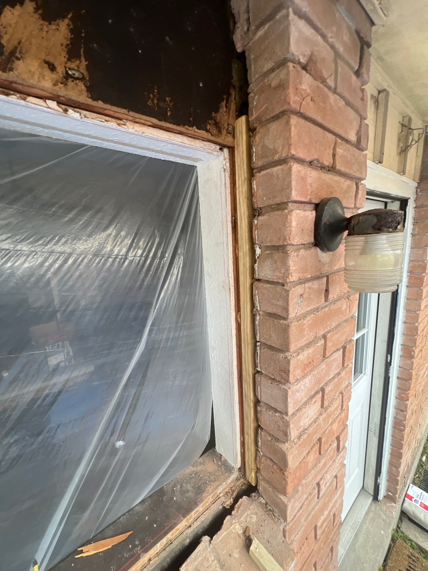 Windows in Brick with a Bay Window by Bayfront Roofing and Construction