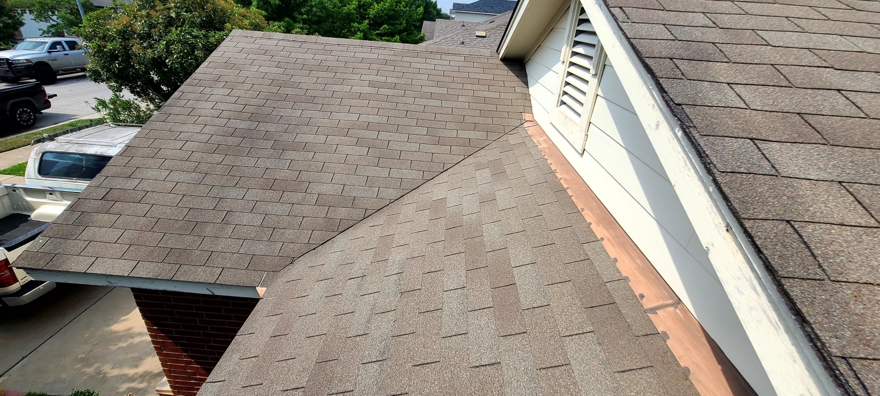 Asphalt Shingle Roof Replacement and Window Glazing in Manor by Caliber Restoration LLC