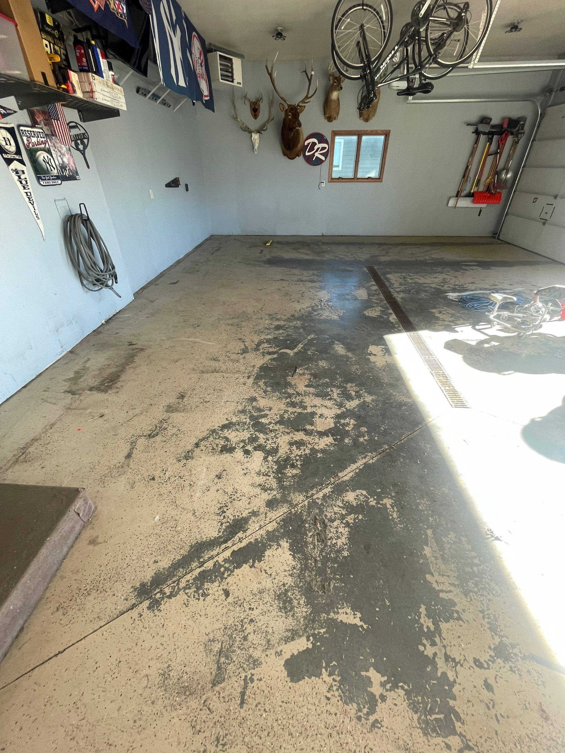 Full Garage Floor Epoxy Coating Installation in Dell Rapids by Select Painting, Coatings & Garage Cabinets