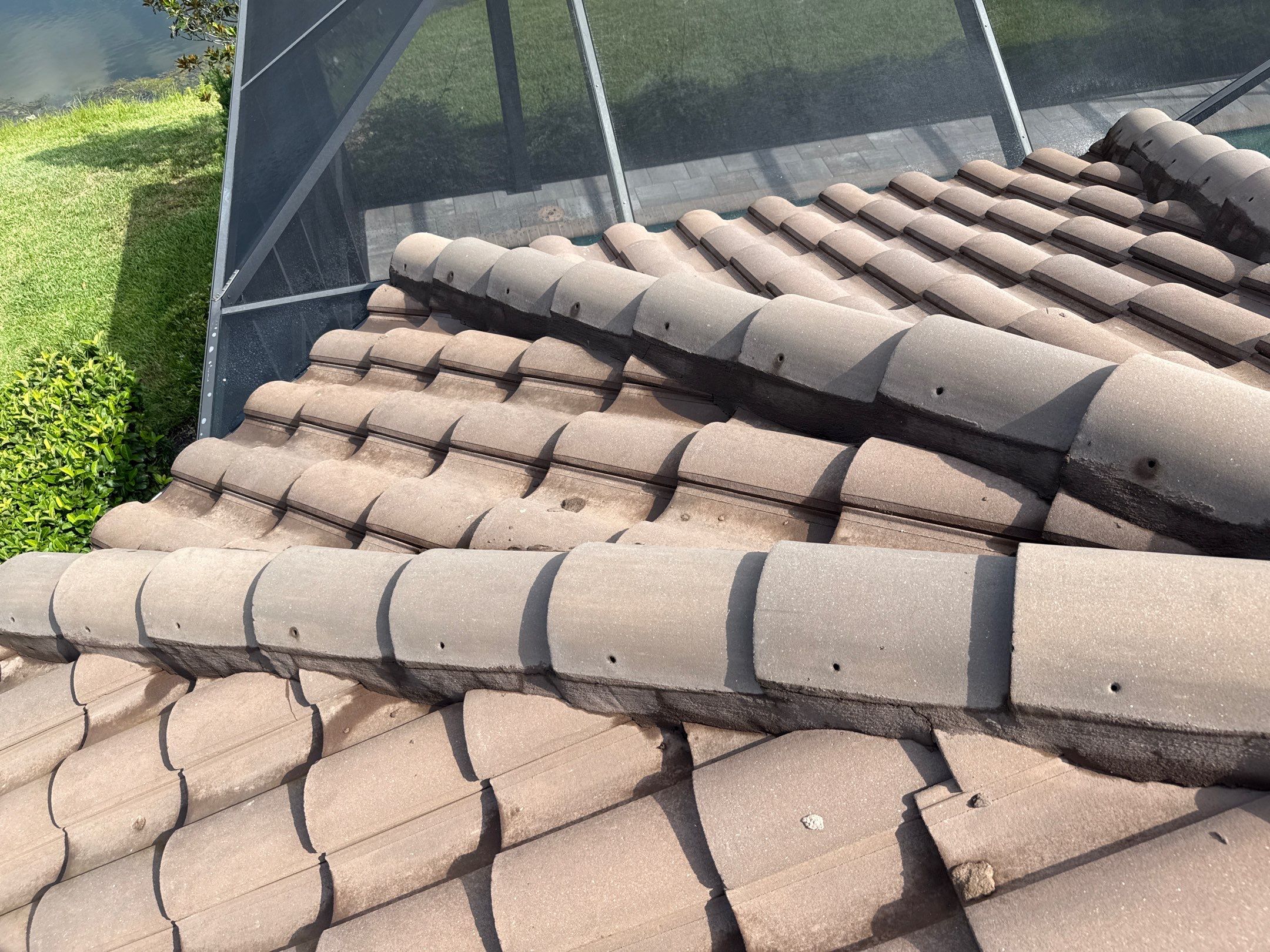 Soft Wash Roof Cleaning – Concrete Tile Roof | Artisan Lakes Esplanade, Palmetto, FL by Sunshine AquaWash