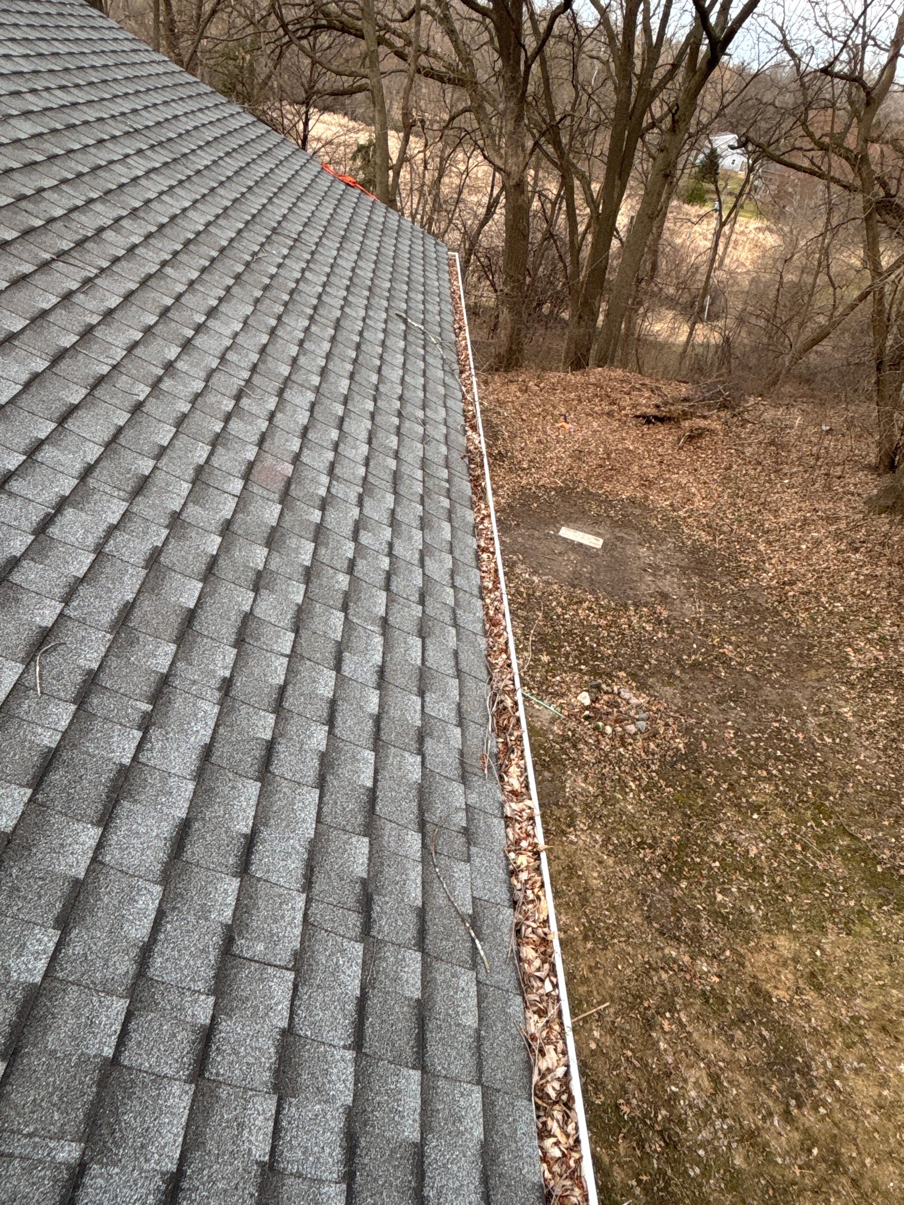 Minnetonka Gutter Cleaning and Leaf Blaster Pro Gutter Guard Installation by Next Level Seamless Gutters / Exteriors Inc.