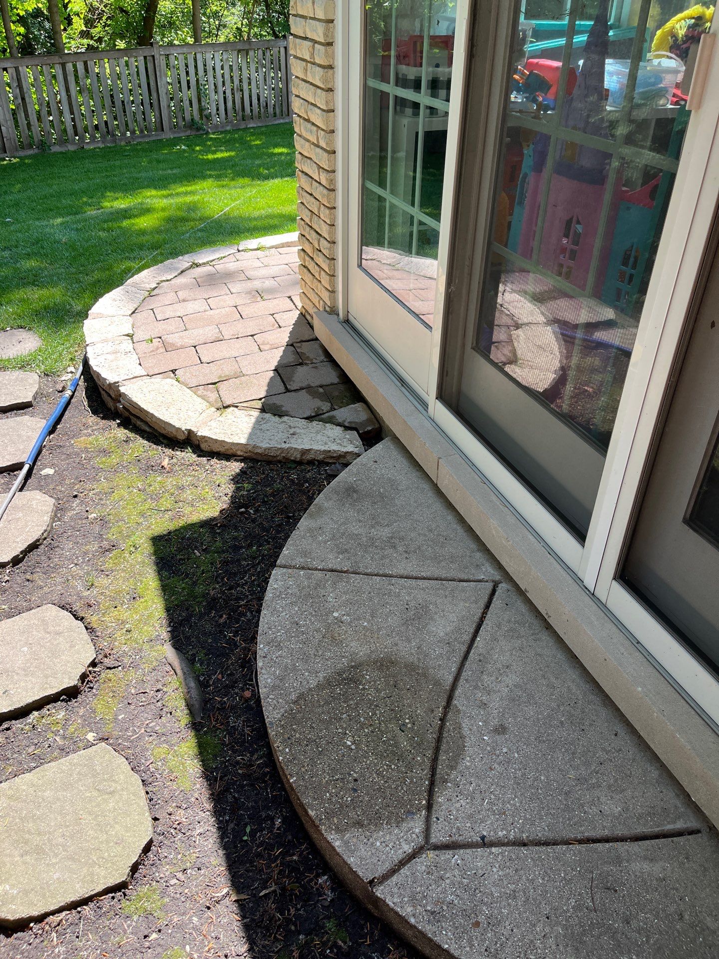 concrete power washing using Algaecide, soft wash soap by Northern Power Washing LLC.