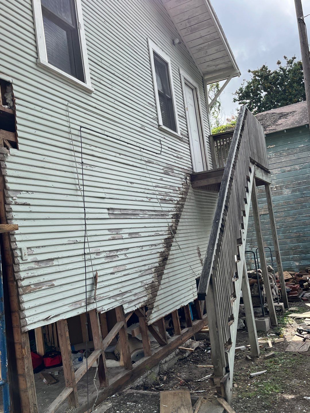 Up Town, Up Class by Bayfront Roofing and Construction