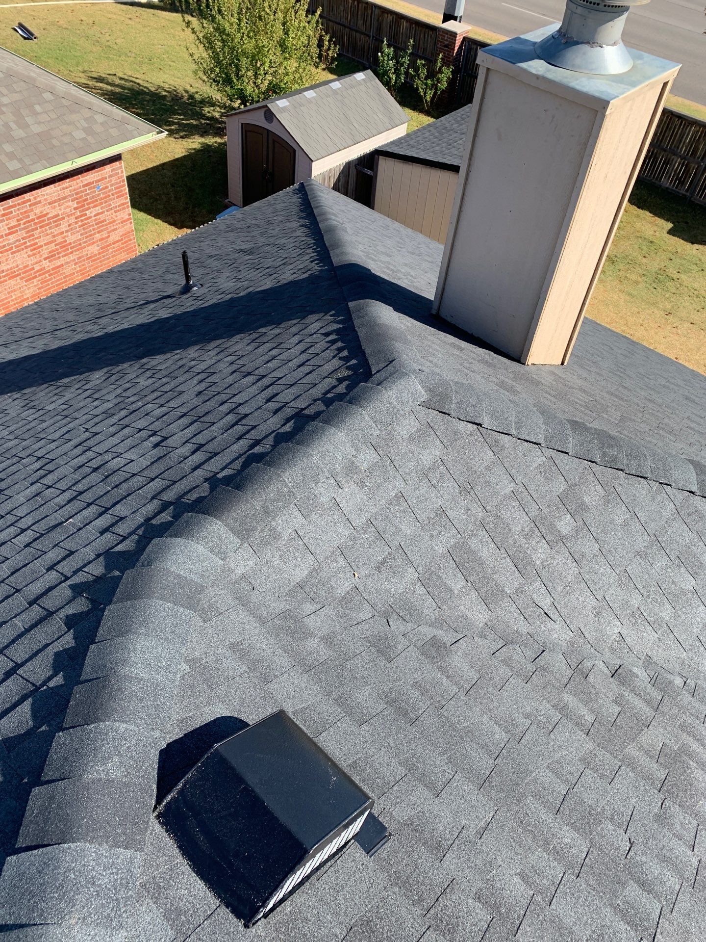 roof replacement & gutter installation in Edmond by McCann's Roofing and Construction