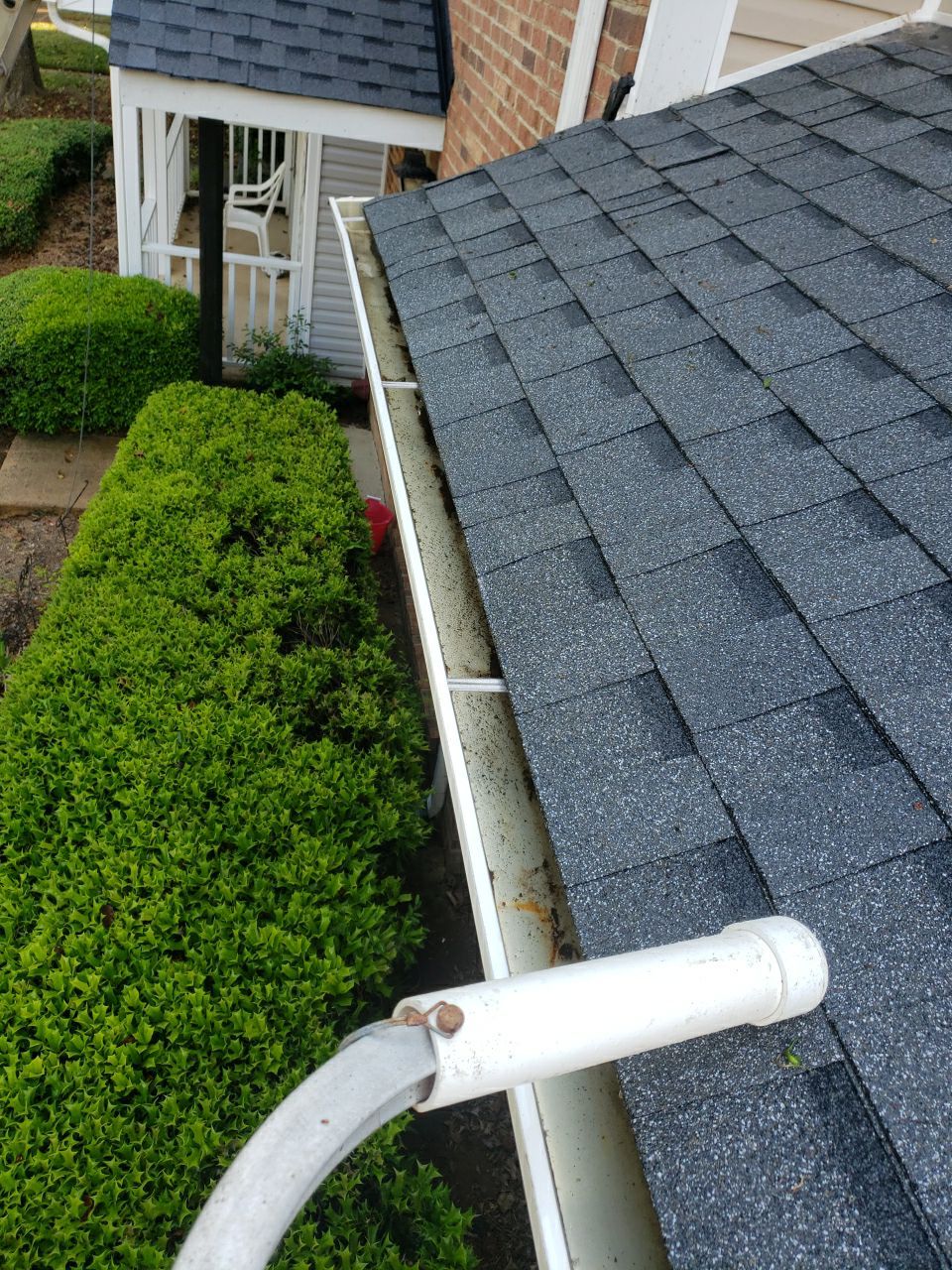 Gutter Cleaning using water by Power Wash Masters LLC