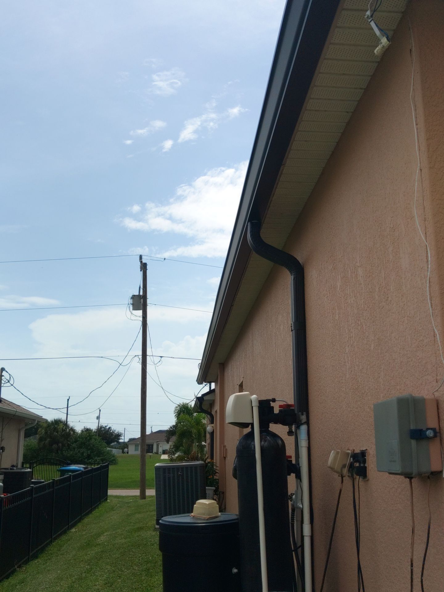 Downspout Installation for Multi-Story Homes in Cape Coral FL by Gutter Professors
