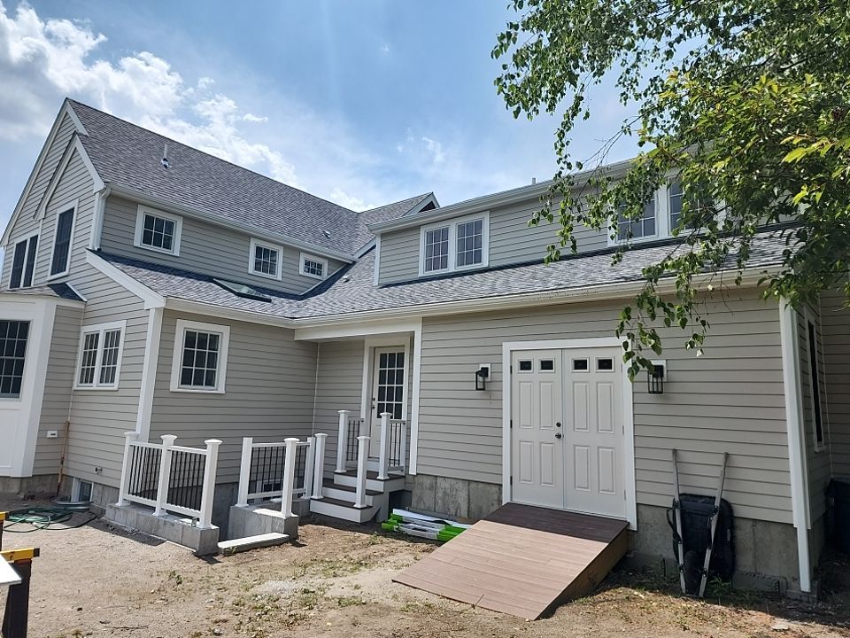 Siding on new construction in Brookline, MA by UBrothers Construction