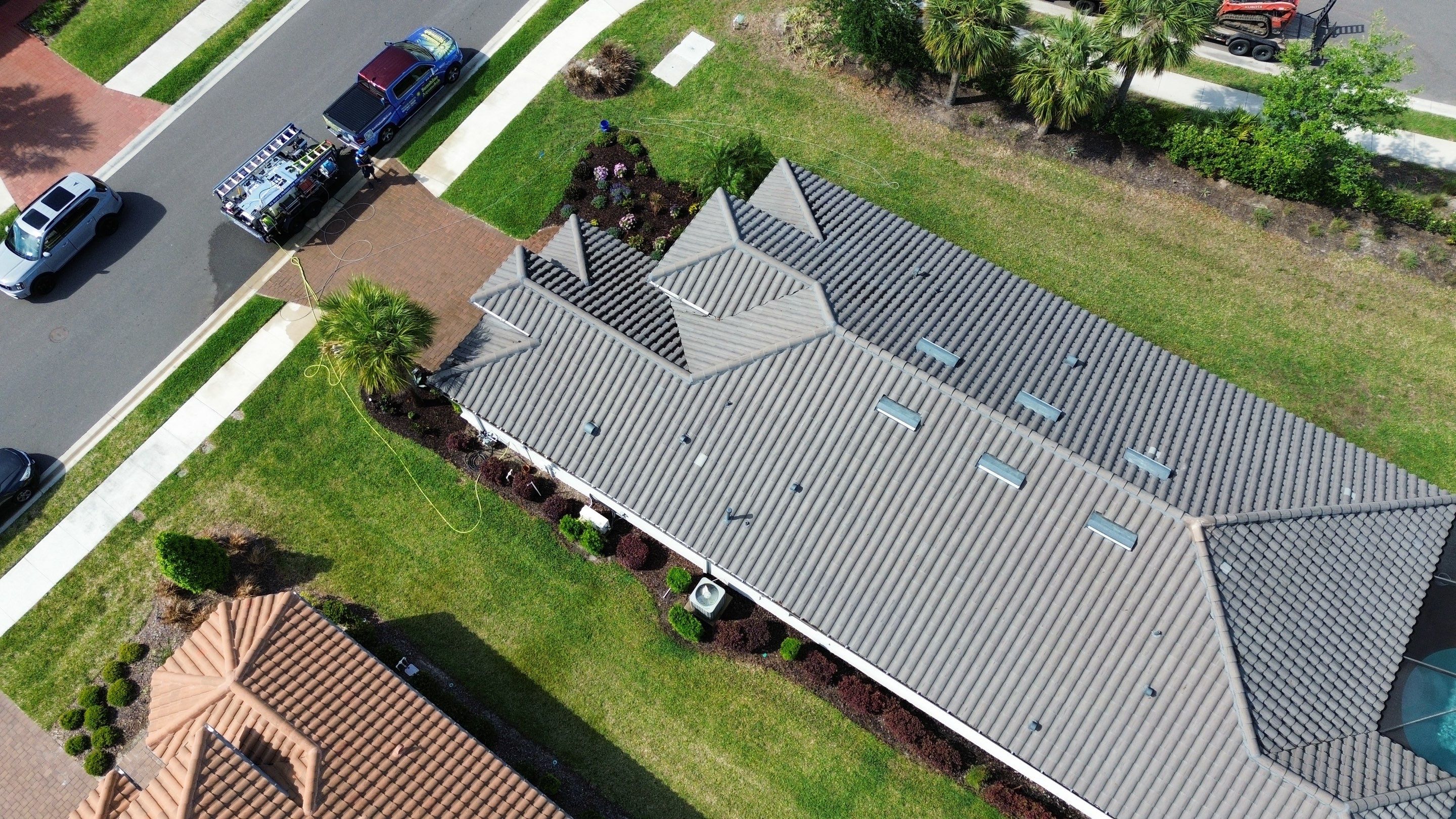 Barrel Tile Roof Cleaning in Artisan Lakes, Palmetto, FL | No Roof Walking on Roof by Sunshine AquaWash