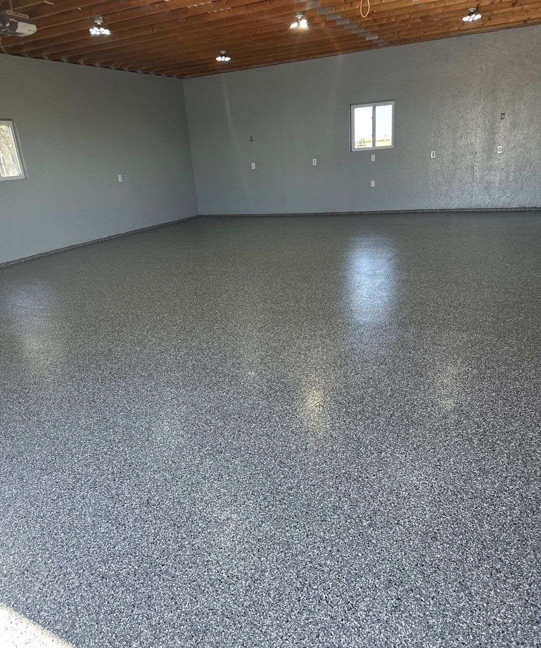 Four-Stall Garage Epoxy Floor Coating in Hampton by Goat Coatings
