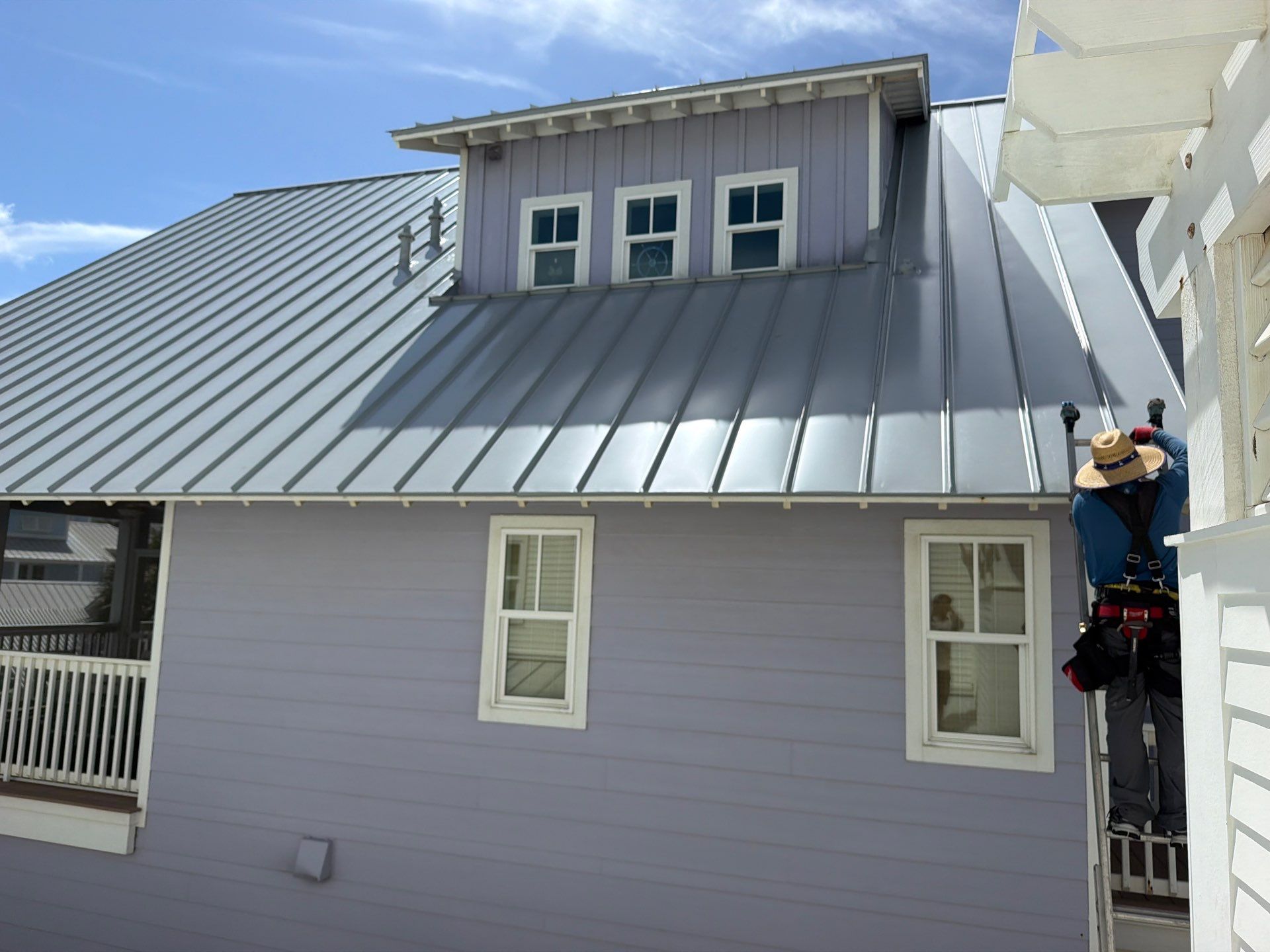 Residential Roof Replacement using .032 Standing Seam Doublelock - Aluminum by Action Exteriors Austin