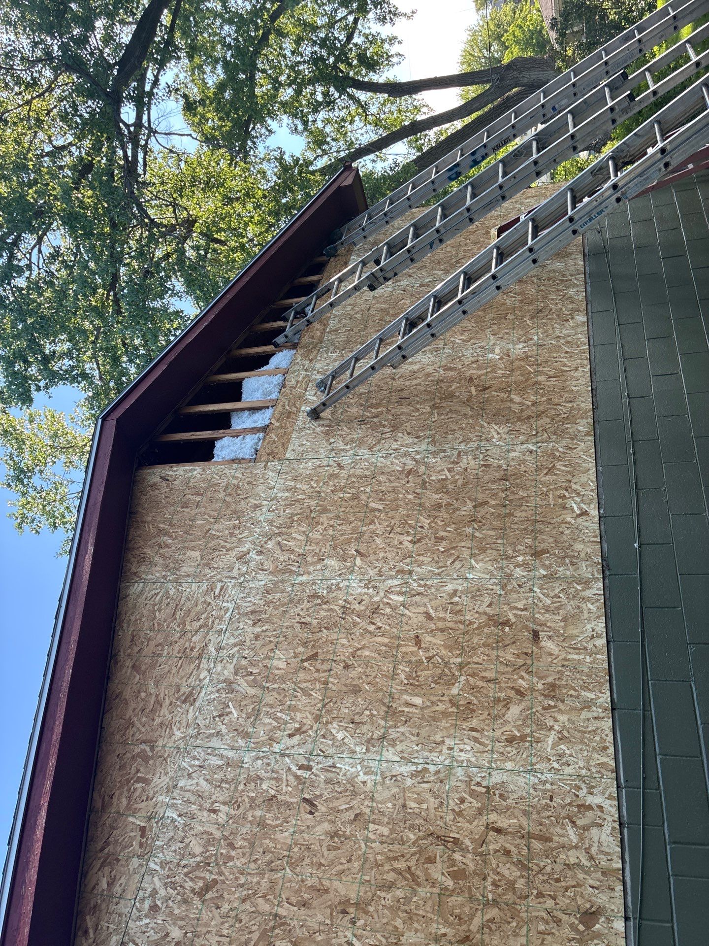 James Hardie Siding Replacement in Omaha with Mountain Sage Finish by Carps Complete Exteriors