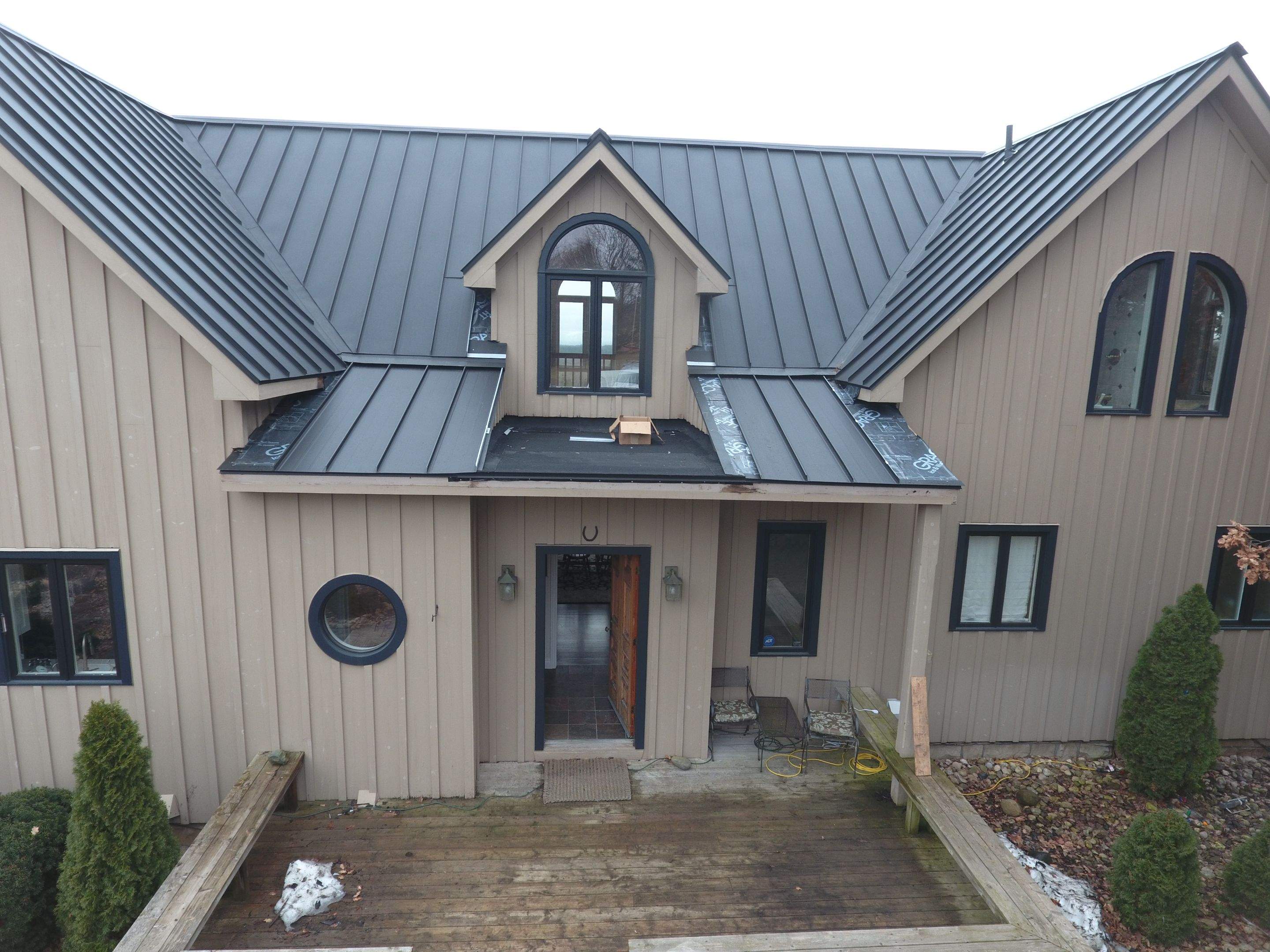 Residential Roofing Installation using 24 Ga Standing Seam Metal by Jay Carter Roofing & Sheet Metal
