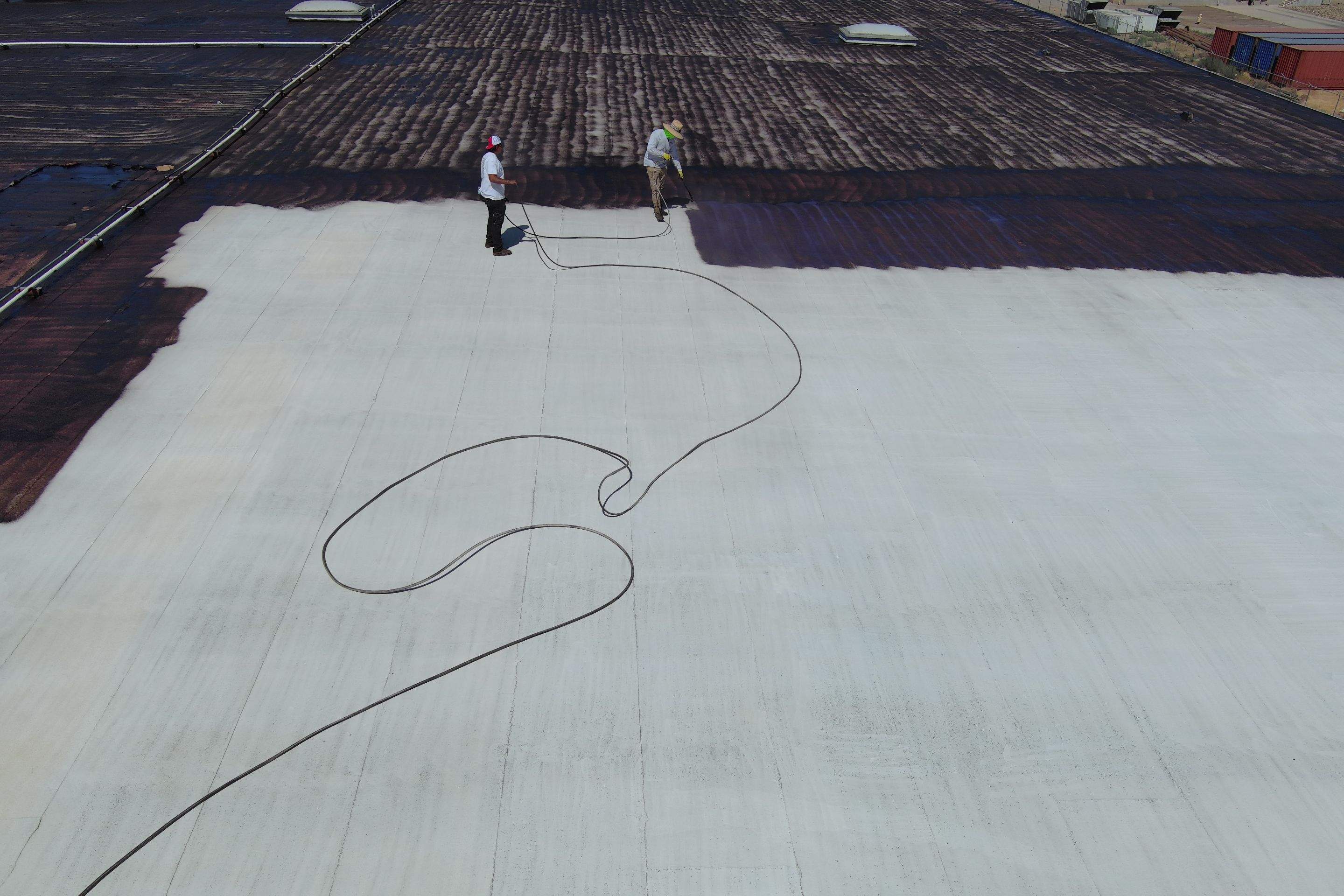 Pro Farms Spray foam roofing project by Straight Edge Roofing Inc